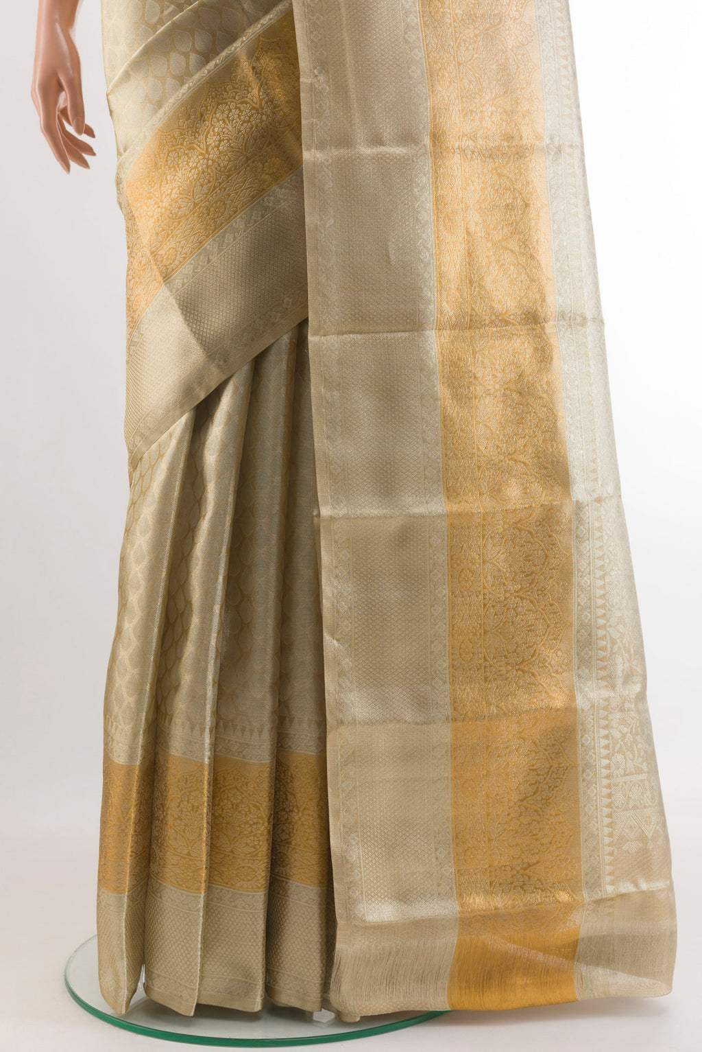 Pleats and pallu of Silver Kanjivaram Tissue Silk Saree with Zari Brocade on the body and Zari Border. 