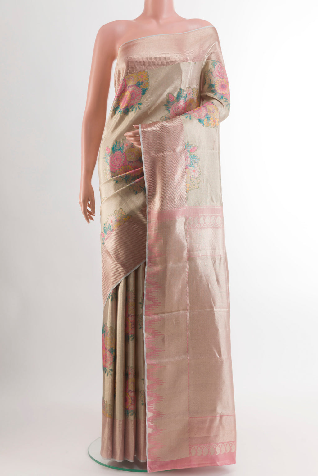Golden Kanchipuram Tissue Silk Saree with Zari Brocade on the body and Zari Border.  displayed on a mannequin