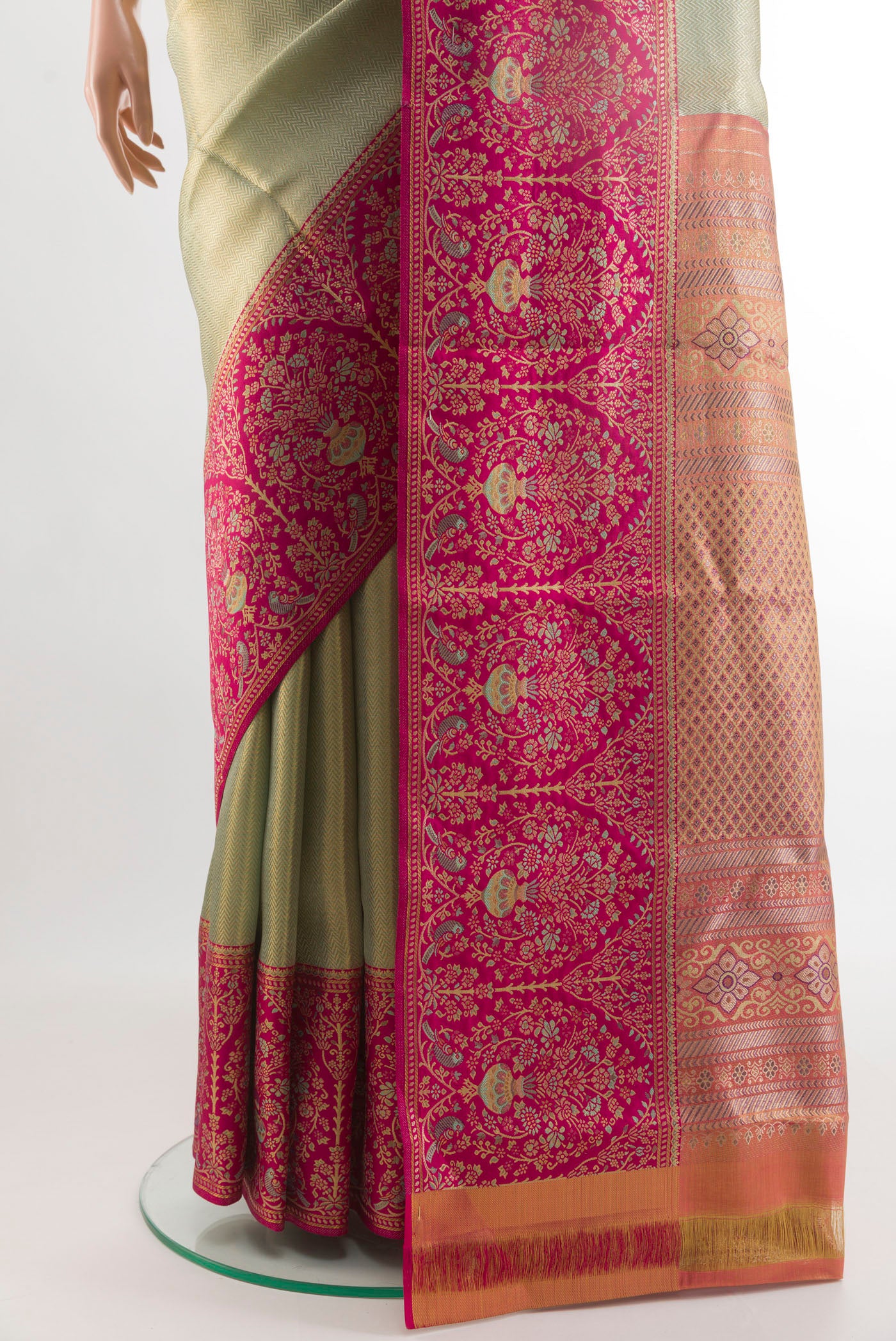 Pleats and pallu of Light Green Kanchipuram Tissue Silk Saree with Zari Brocade on the body and Zari Border. 