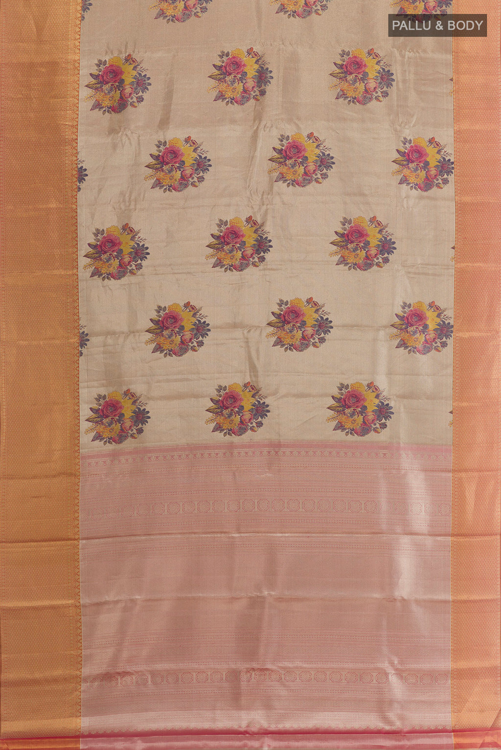 Flat view of Rose Gold Kanchipuram Tissue Silk Saree with Zari Brocade on the body and Zari Border. 