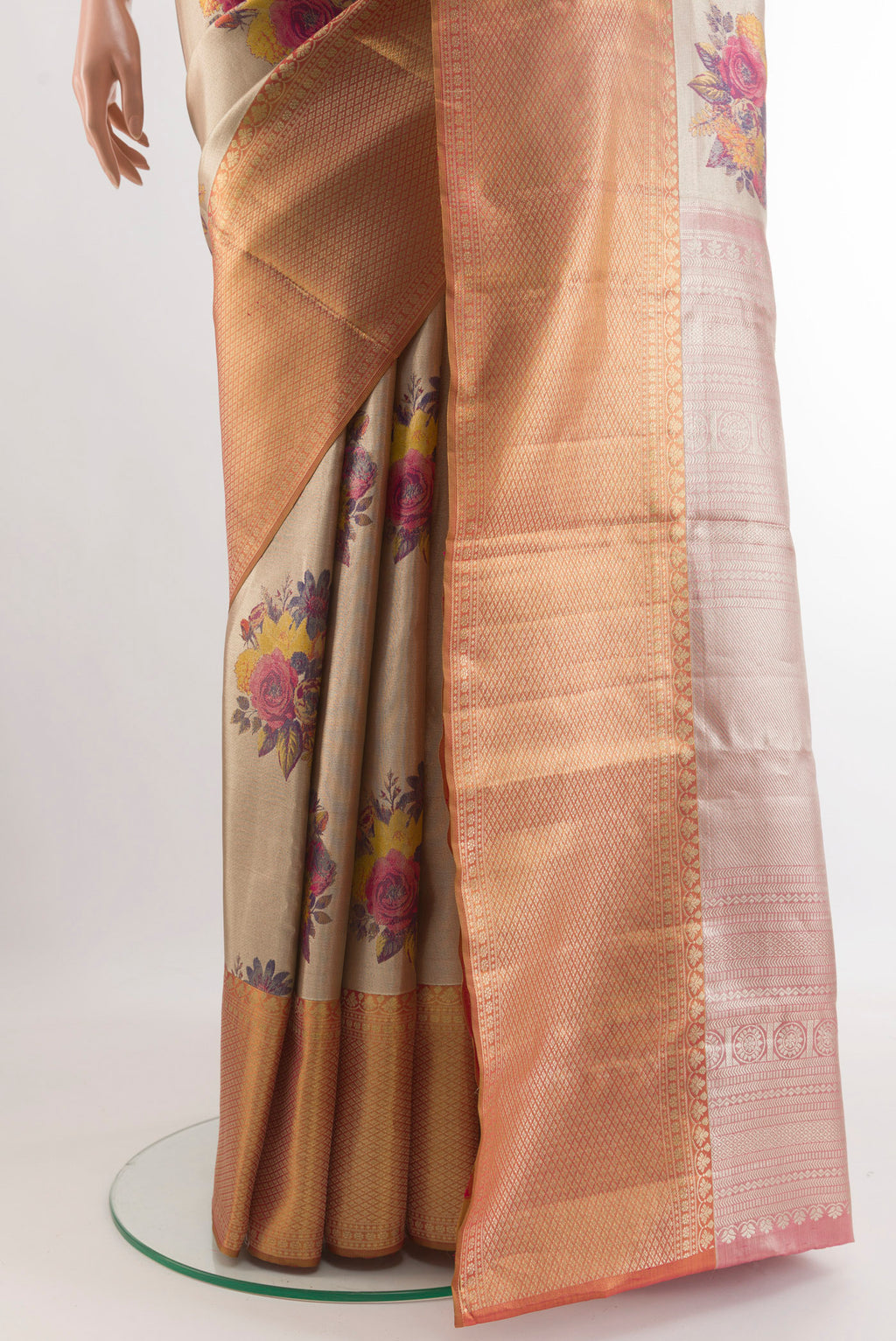 Pleats and pallu of Rose Gold Kanchipuram Tissue Silk Saree with Zari Brocade on the body and Zari Border. 