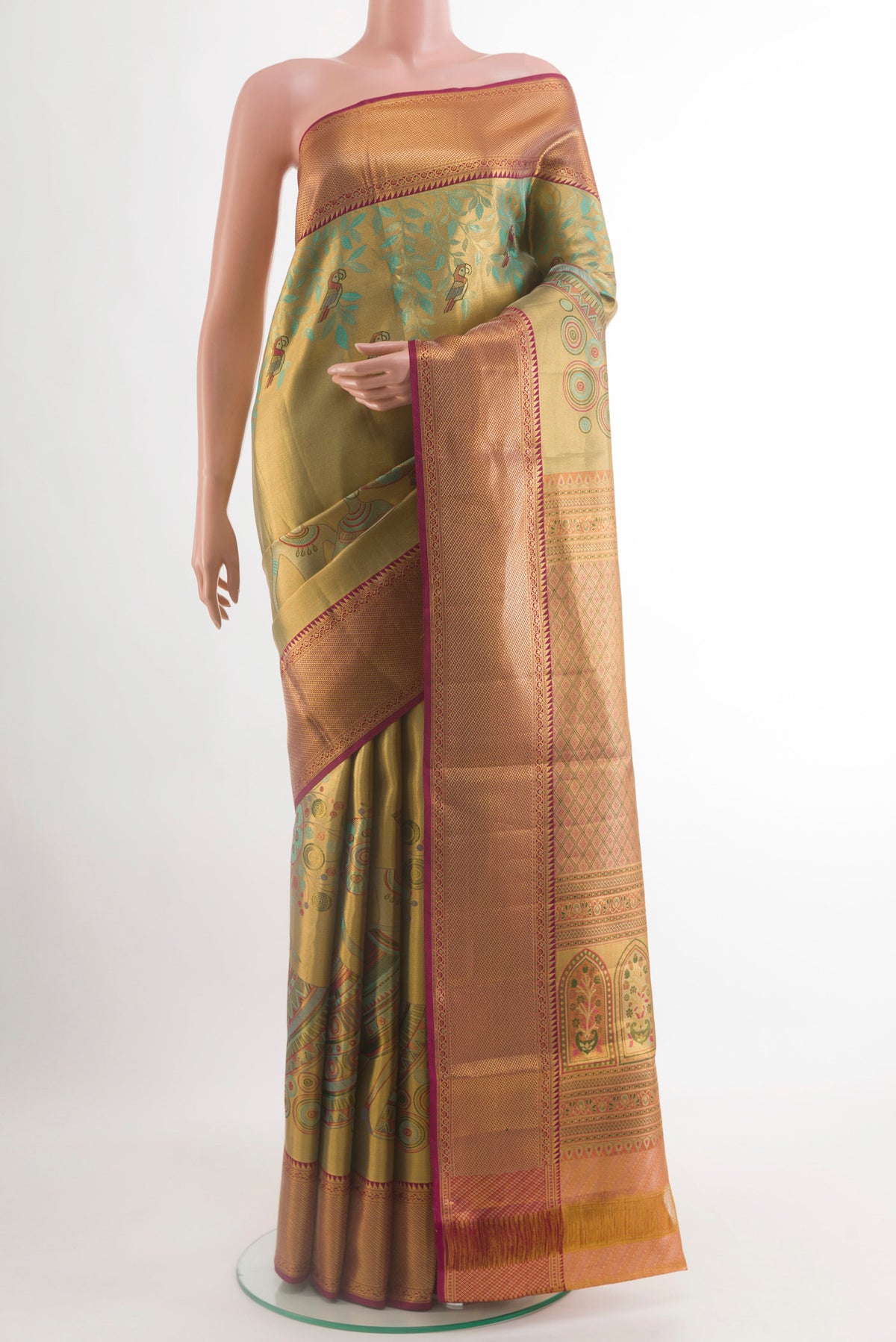 Golden Dual Tone Kanchipuram Tissue Silk Saree with Zari Brocade on the body and Zari Border.  displayed on a mannequin