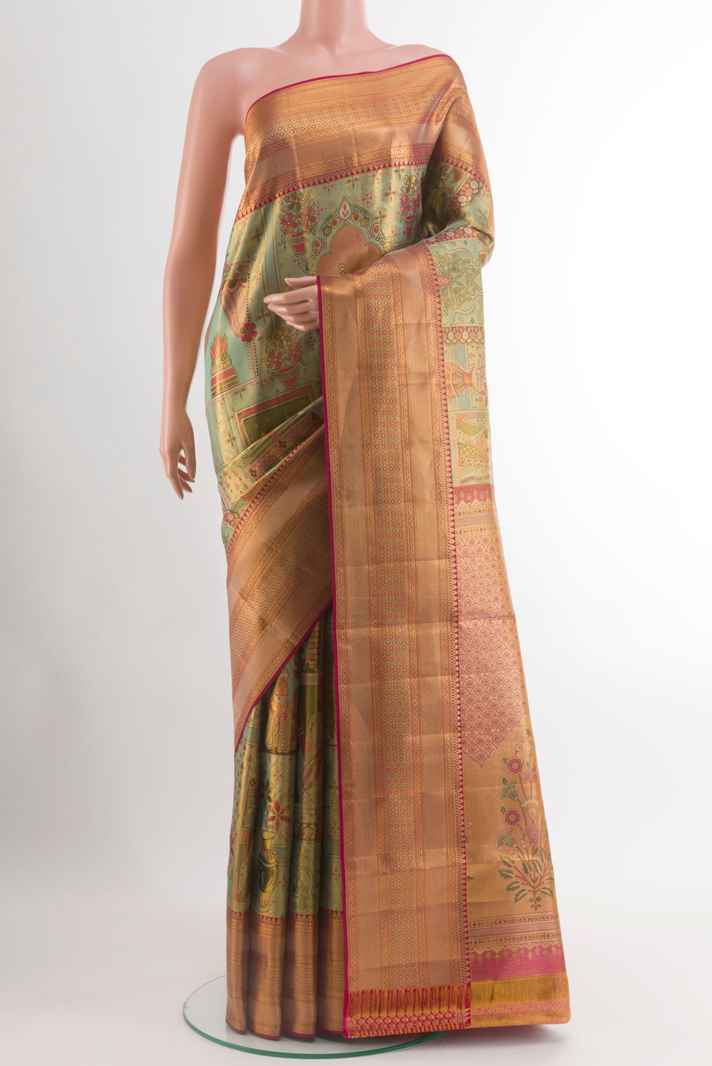 Sea Green Kanchipuram Tissue Silk Saree with Zari Brocade on the body and Zari Border.  displayed on a mannequin
