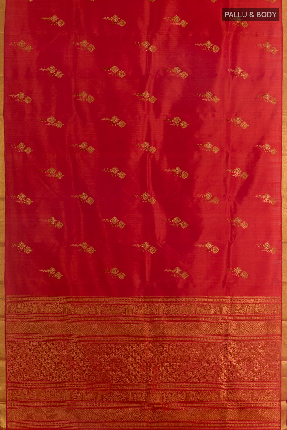Flat view of Pure Silk Red Kanjivaram Saree with Zari Butta on the body and Zari Border. 