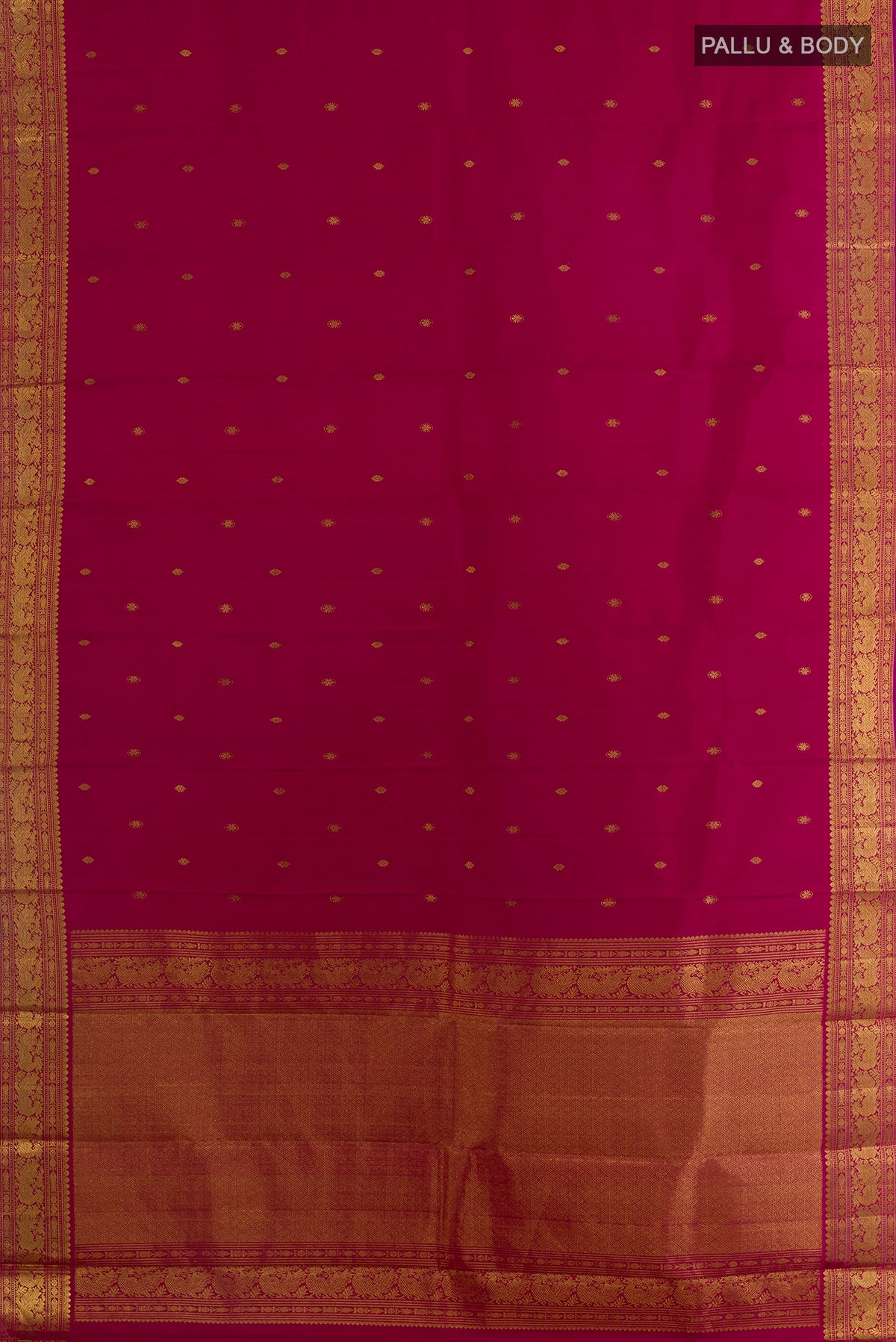 Flat view of Pure Silk Maroon Kanjivaram Saree with Zari Butta on the body and Zari Border. 