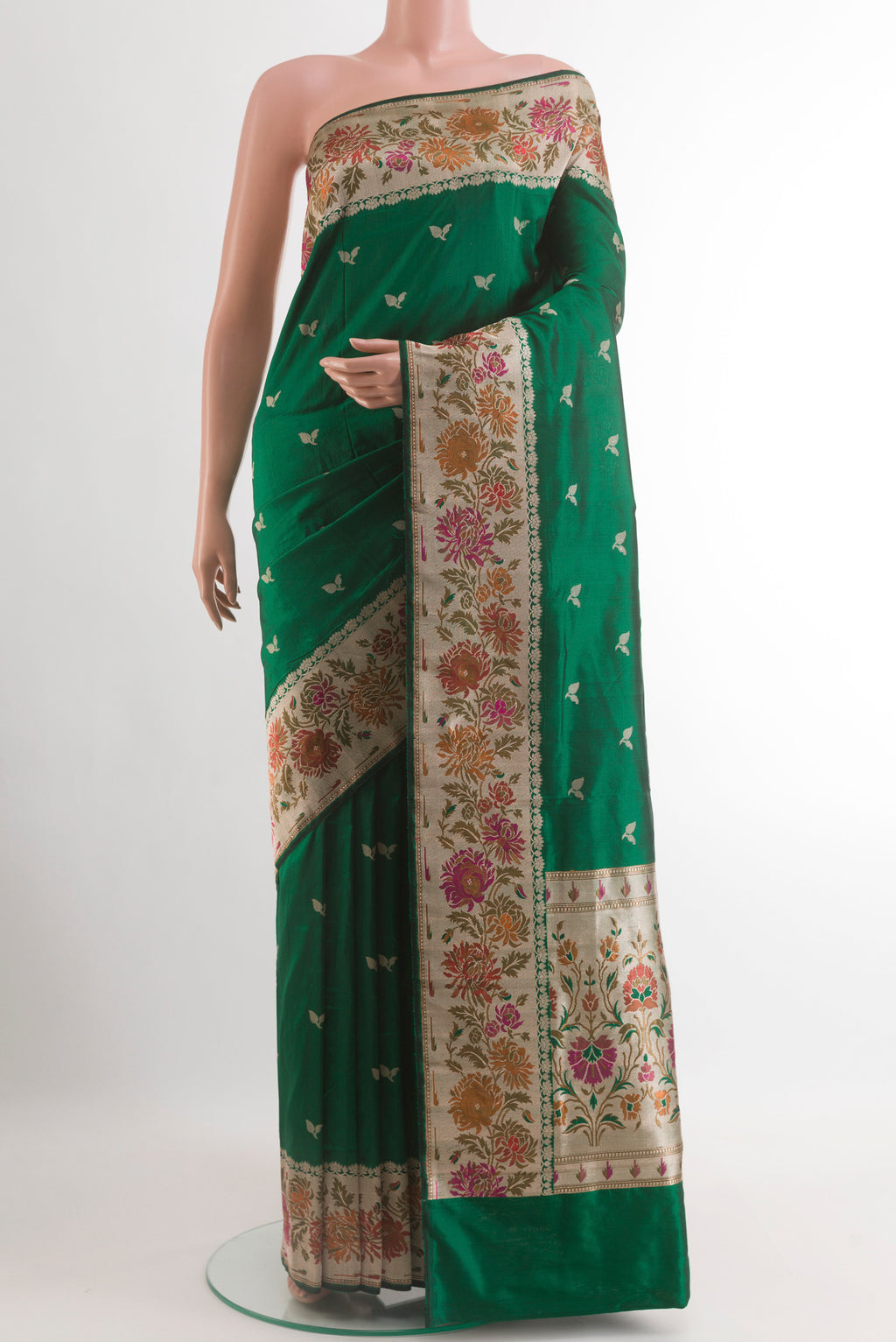 Bottle Green Banarasi Silk Saree with Zari Butta on the body and Zari Border.  displayed on a mannequin