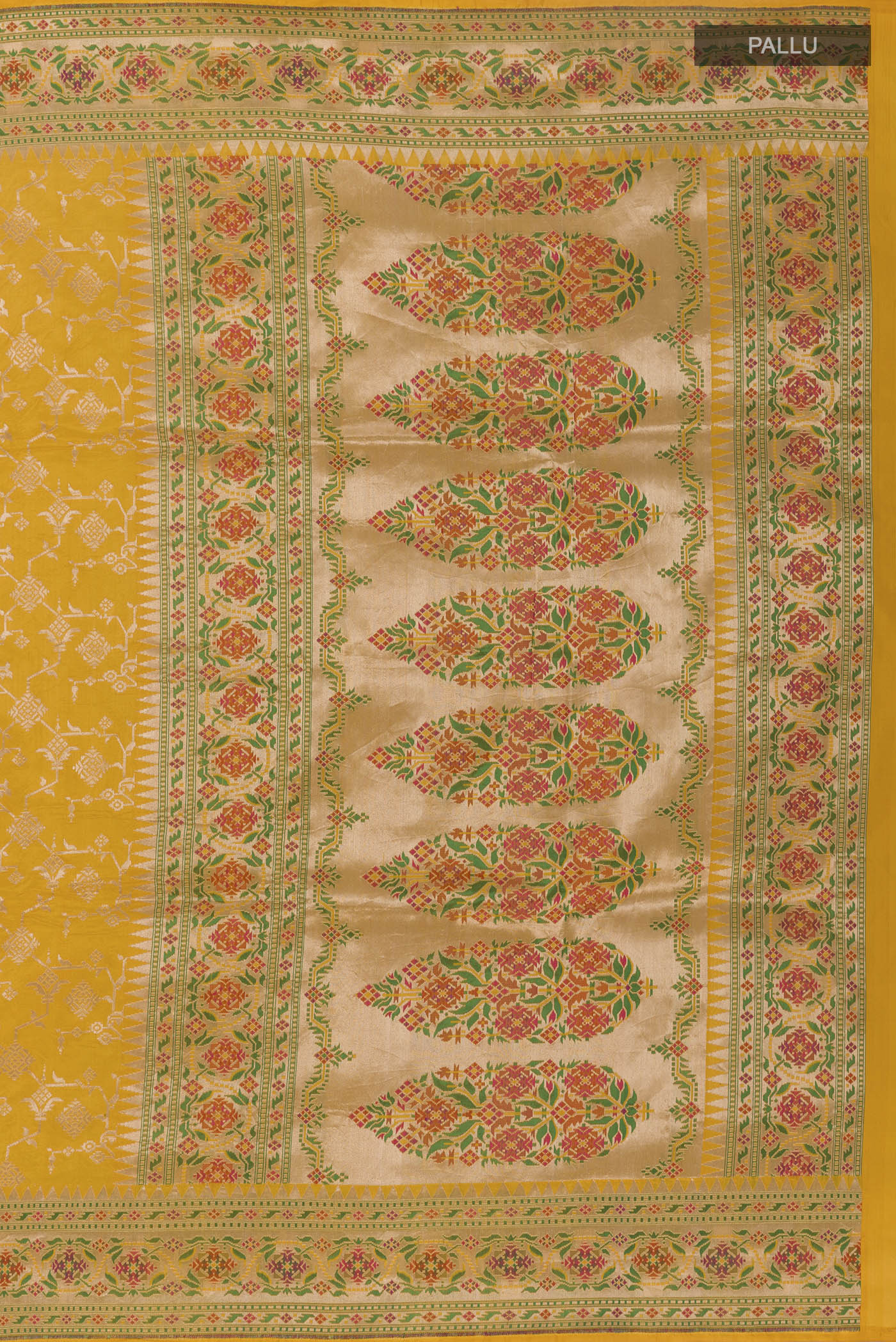 Close up image of the pallu of Yellow Banarasi Silk Saree with Zari Brocade on the body and Paithani Border. 