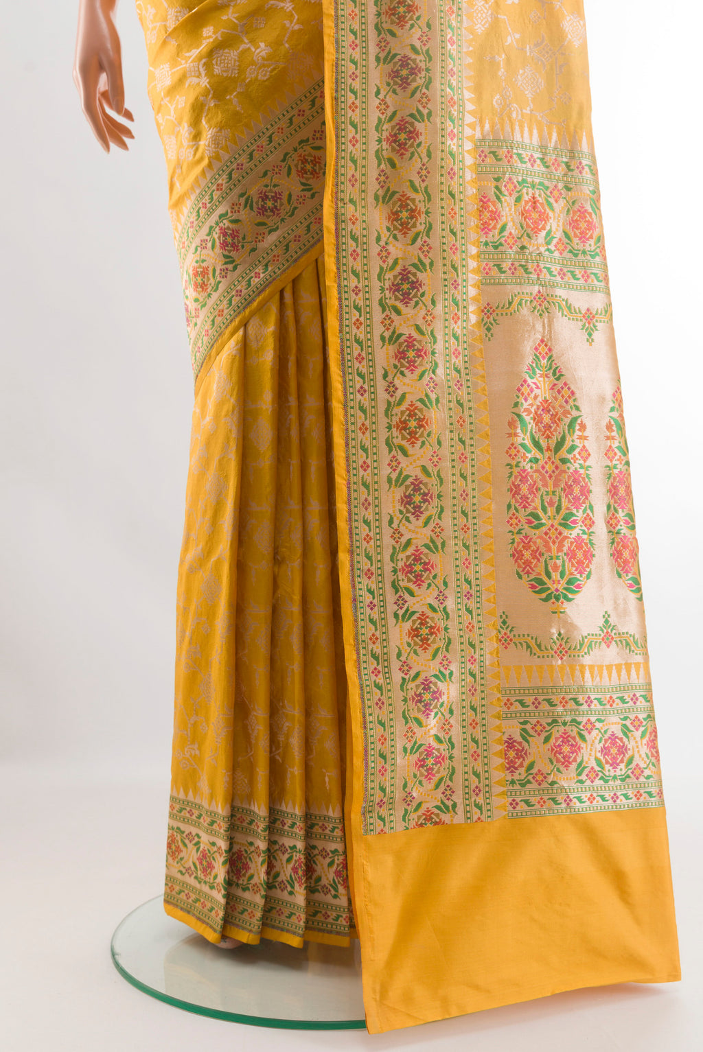 Pleats and pallu of Yellow Banarasi Silk Saree with Zari Brocade on the body and Paithani Border. 