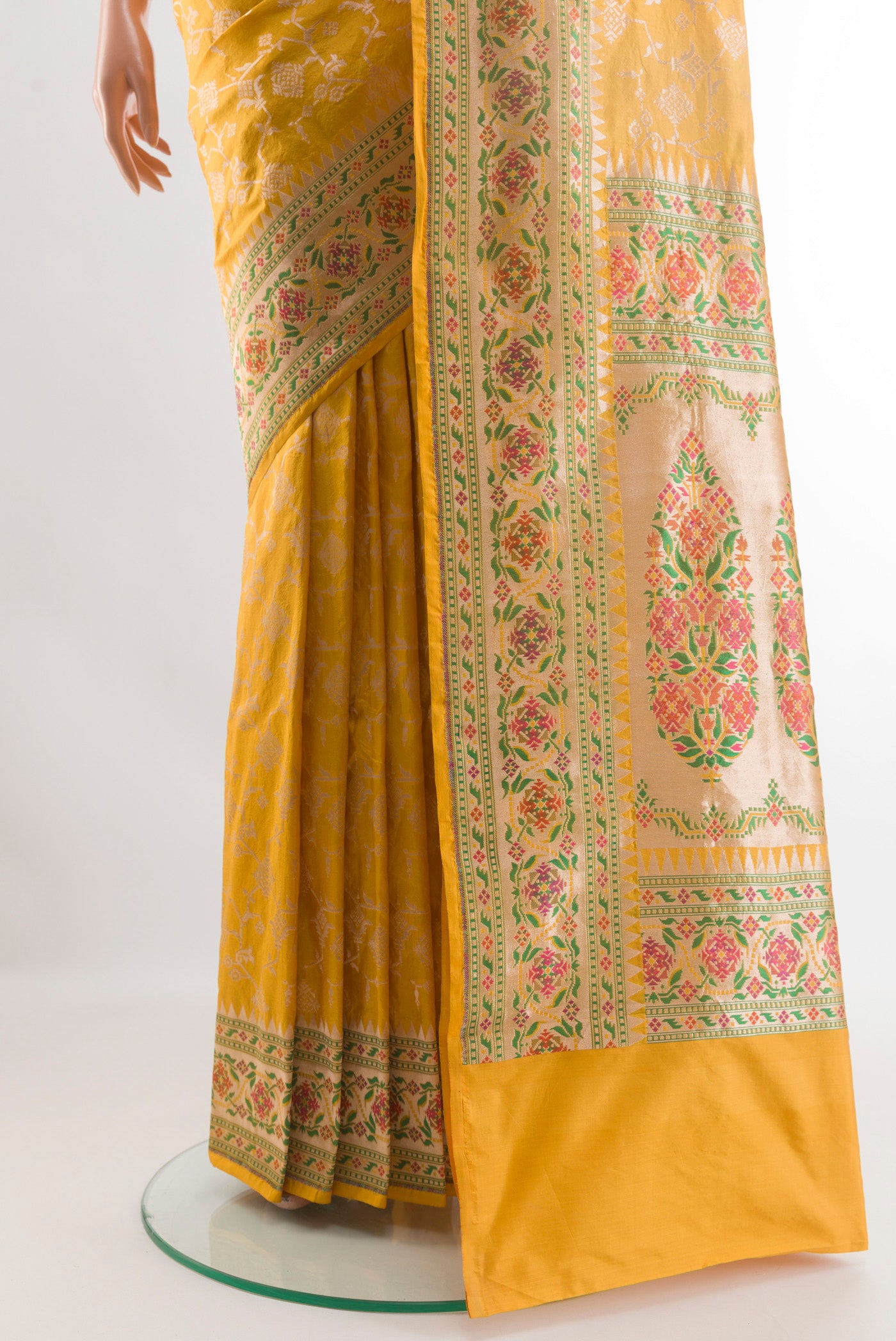 Pleats and pallu of Yellow Banarasi Silk Saree with Zari Brocade on the body and Paithani Border. 