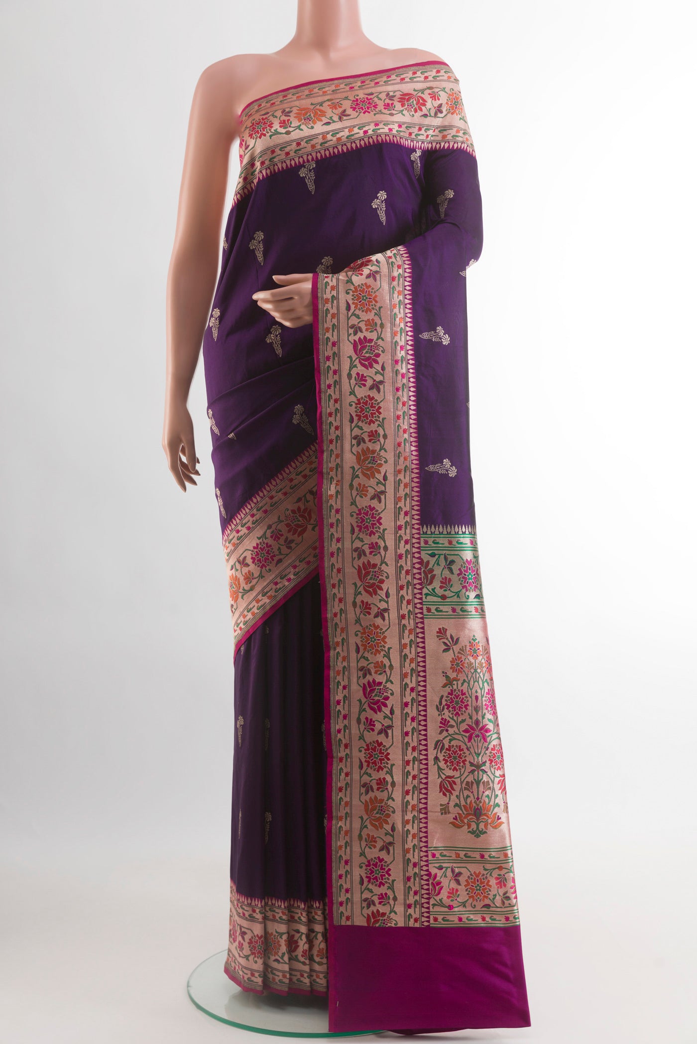 Purple Banarasi Silk Saree with Zari Butta on the body and Paithani Border.  displayed on a mannequin