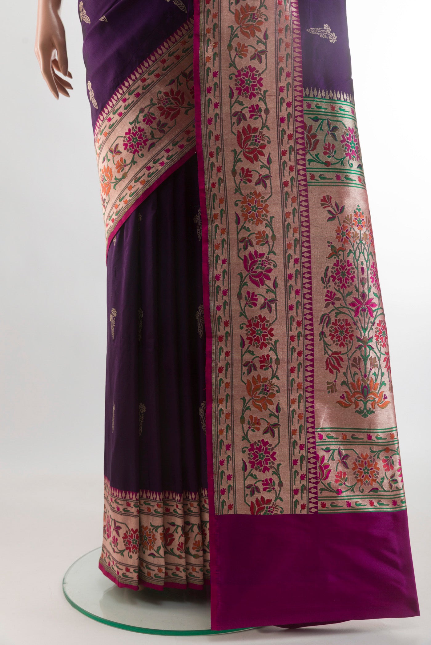 Pleats and pallu of Purple Banarasi Silk Saree with Zari Butta on the body and Paithani Border. 