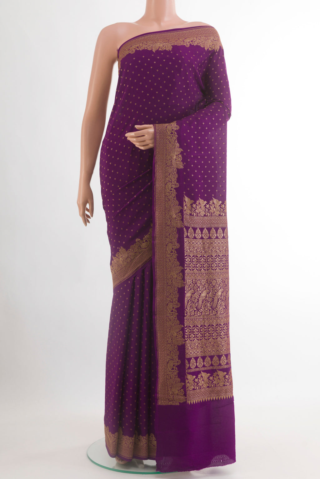 Purple Banarasi Georgette Saree with Zari Butta on the body and Zari Border.  displayed on a mannequin