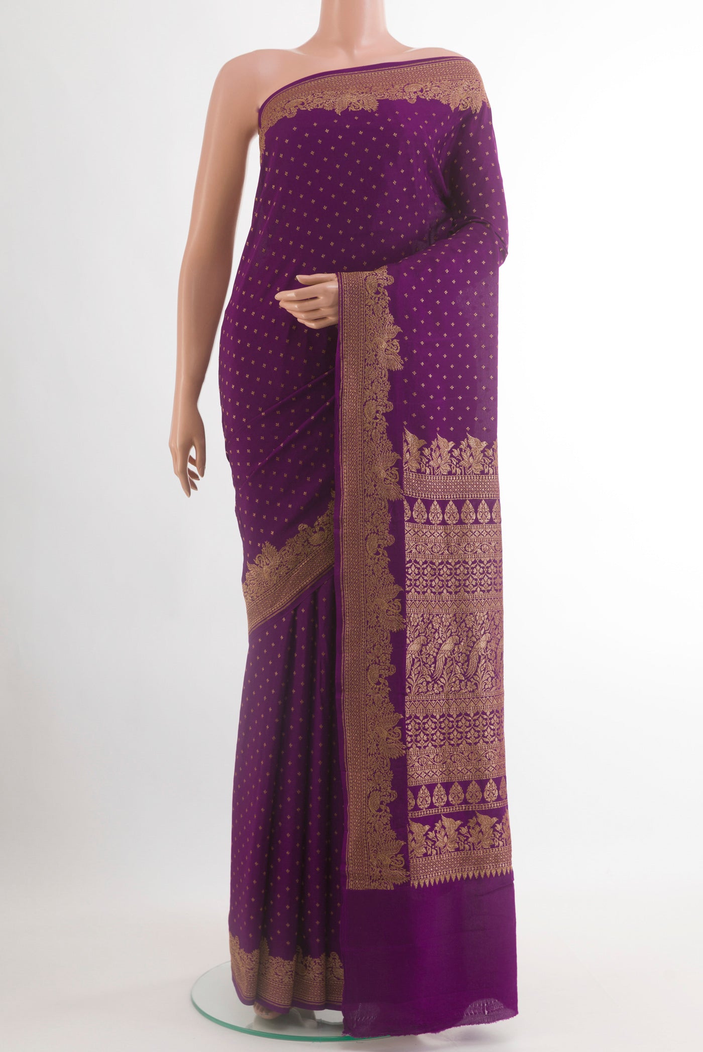 Purple Banarasi Georgette Saree with Zari Butta on the body and Zari Border.  displayed on a mannequin