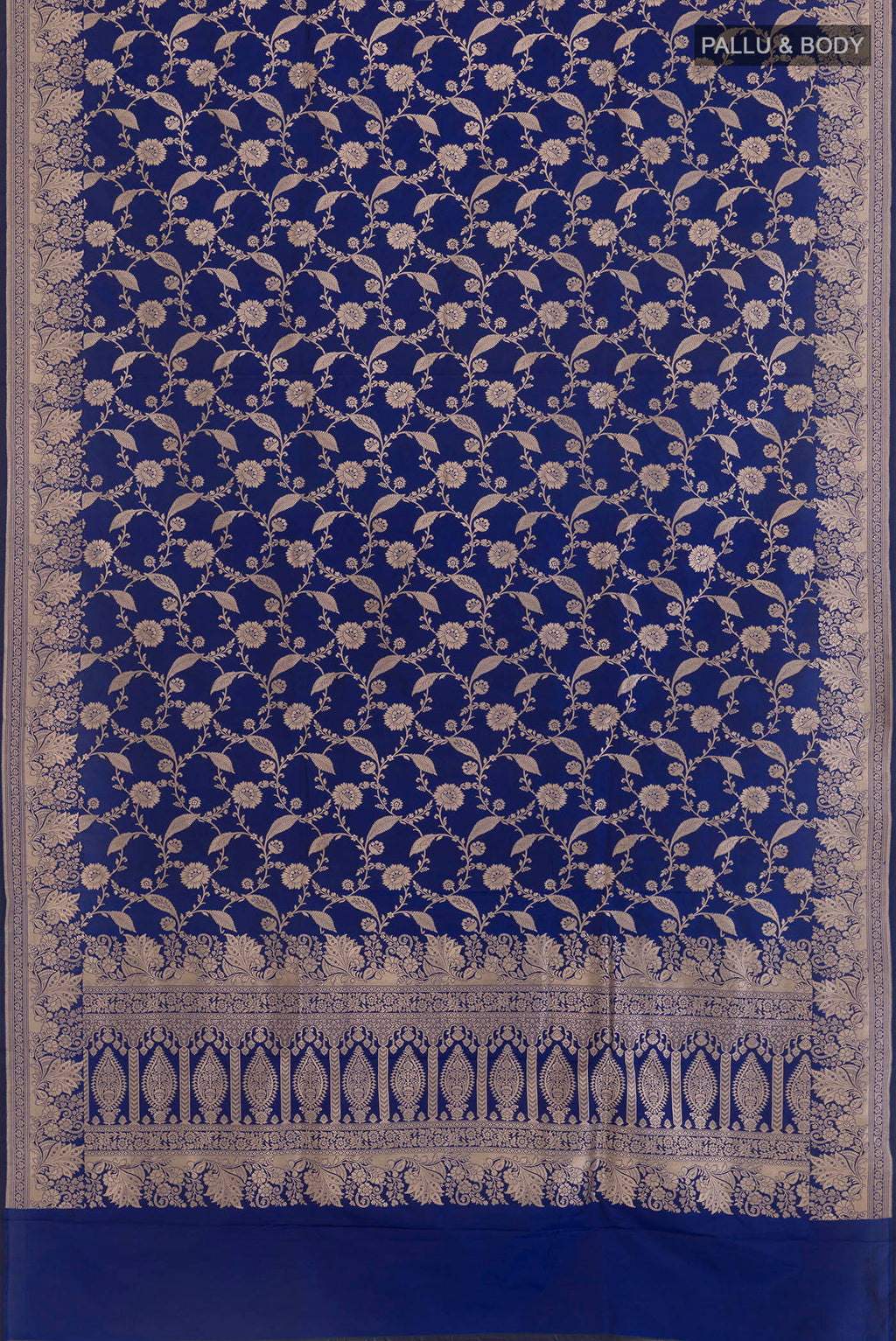 Flat view of Blue Banarasi Silk Saree with Zari Brocade on the body and Zari Border. 