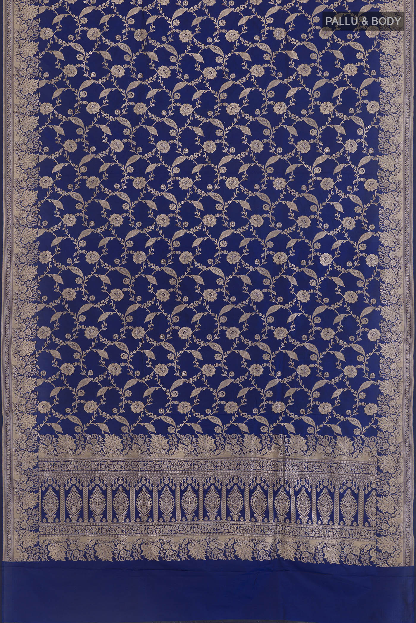 Flat view of Blue Banarasi Silk Saree with Zari Brocade on the body and Zari Border. 