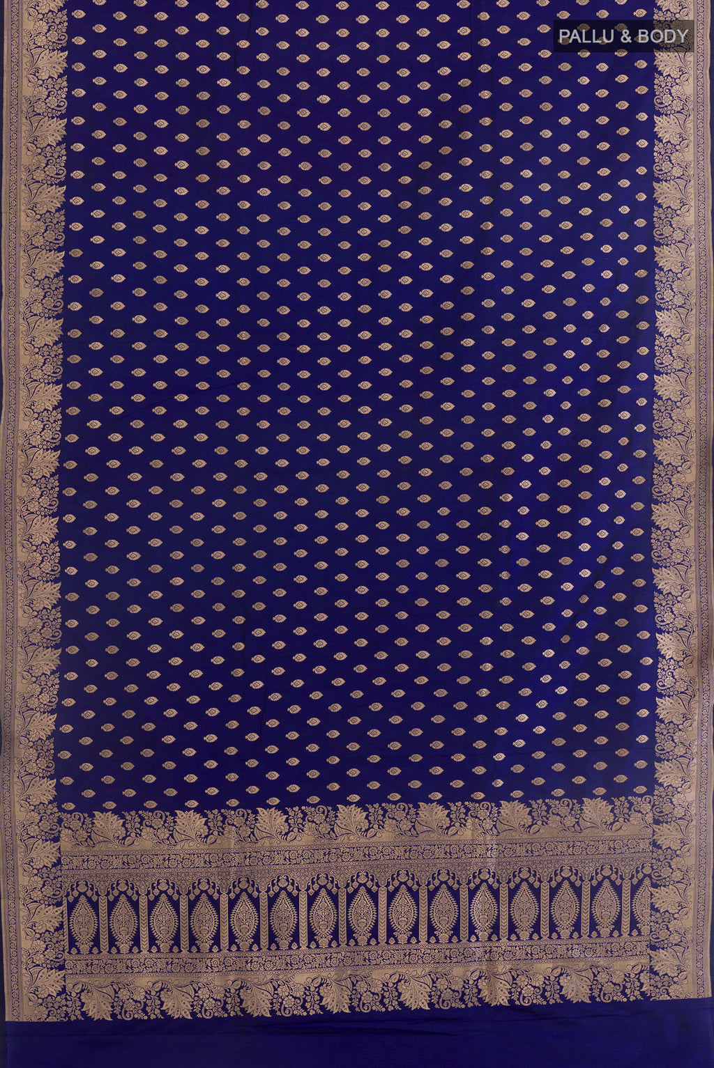 Flat view of Blue Banarasi Katan Silk Saree with Zari Butta on the body and Zari Border. 
