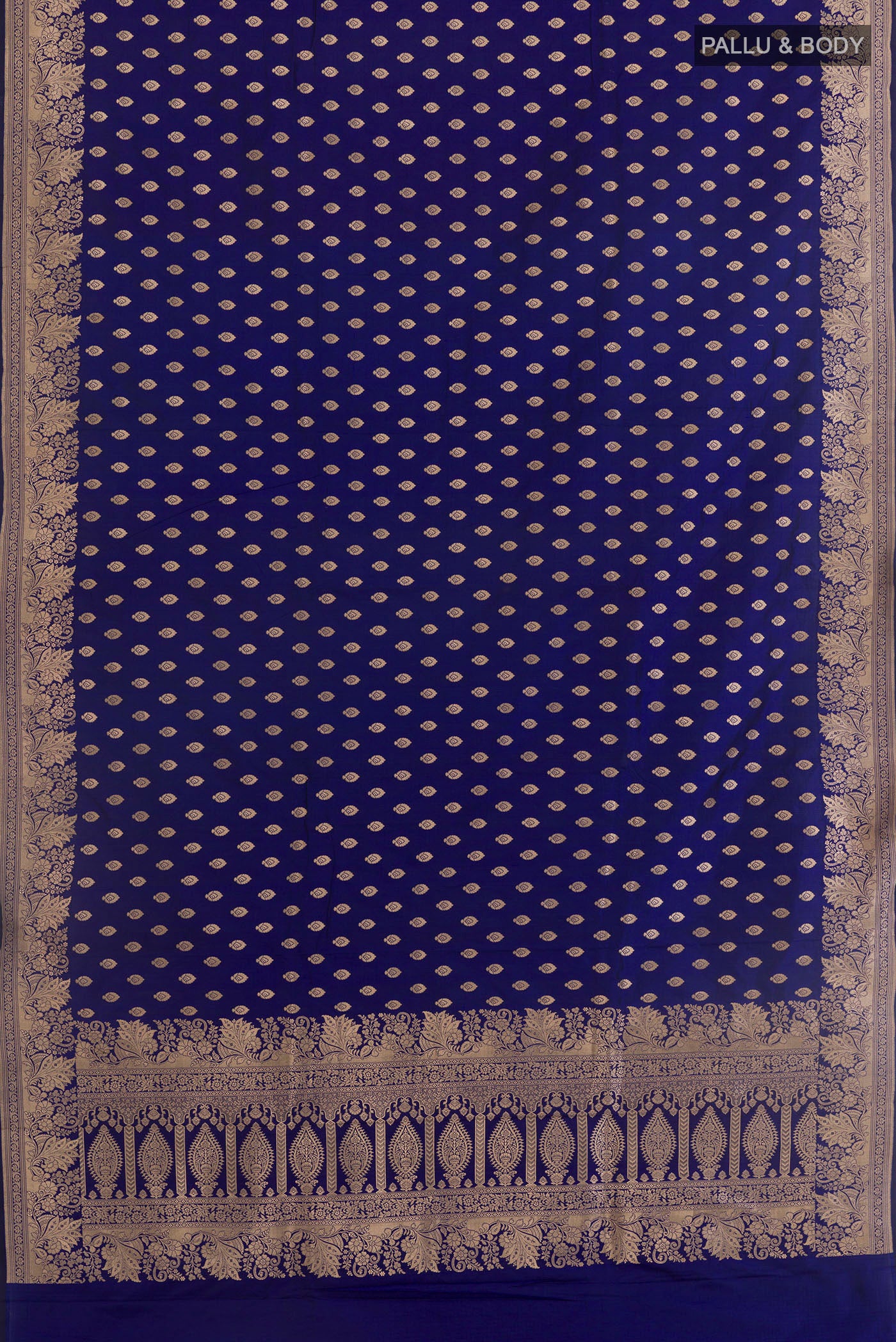 Flat view of Blue Banarasi Katan Silk Saree with Zari Butta on the body and Zari Border. 