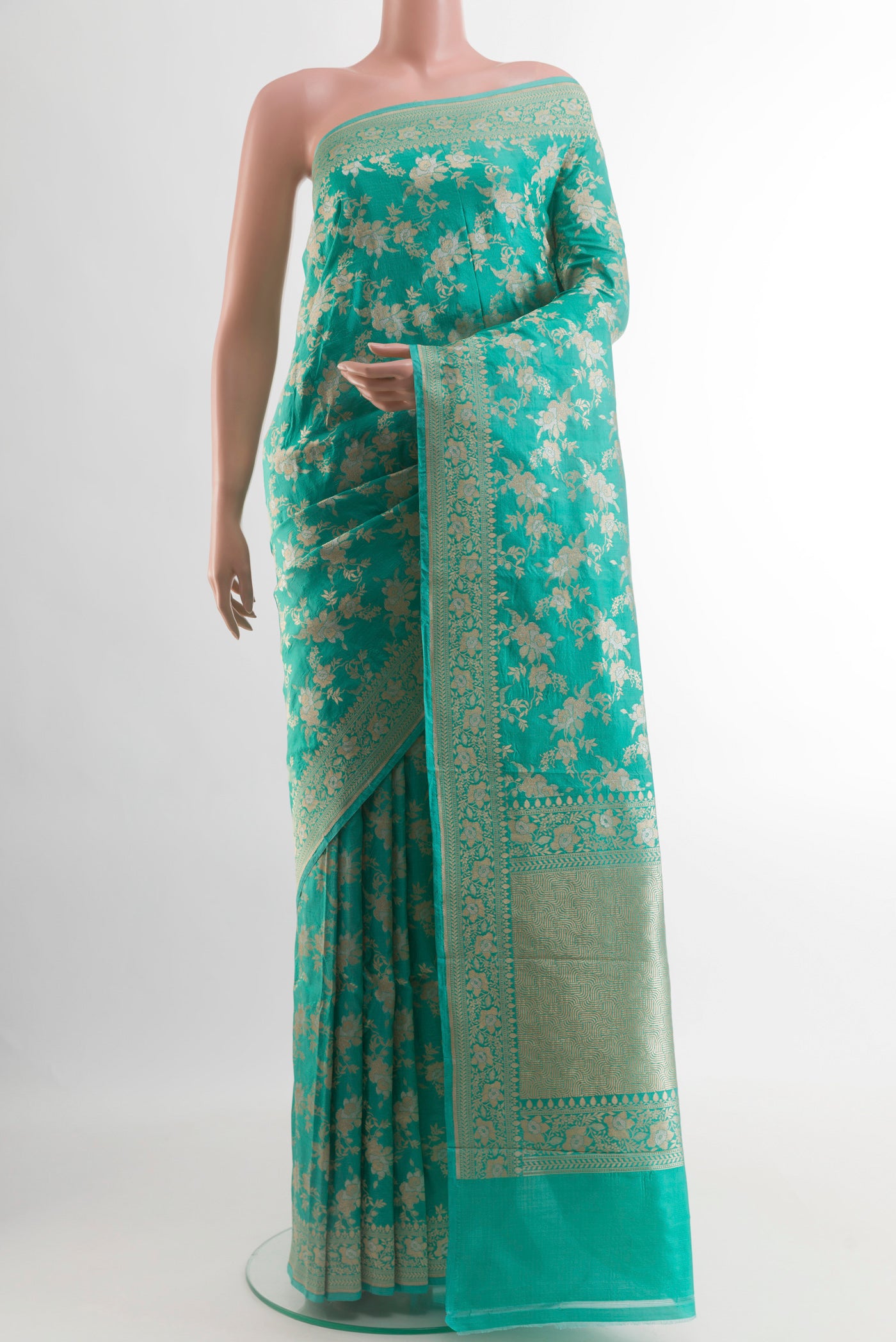 Turquoise Banarasi Silk Saree with Zari Brocade on the body and Zari Border.  displayed on a mannequin