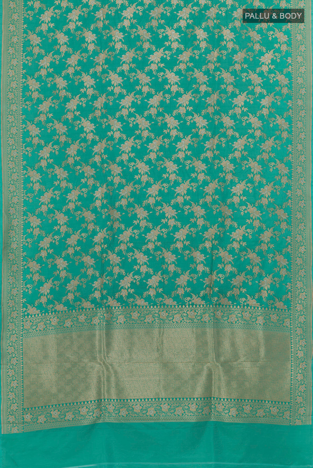 Flat view of Turquoise Banarasi Silk Saree with Zari Brocade on the body and Zari Border. 