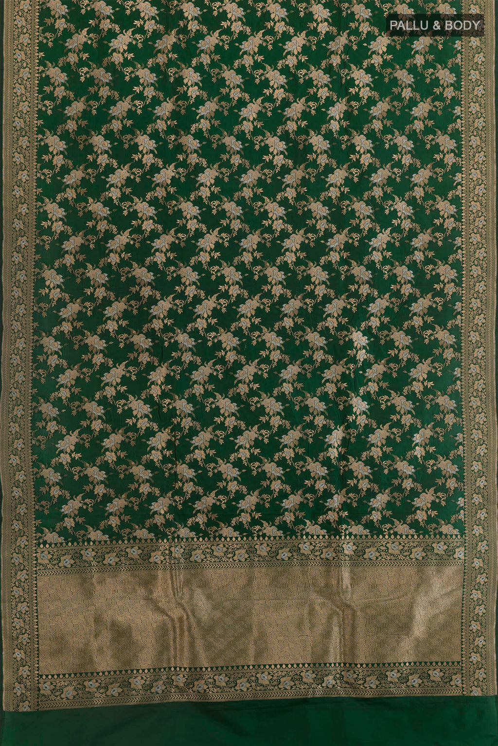 Flat view of Bottle Green Banarasi Silk Saree with Zari Brocade on the body and Zari Border. 