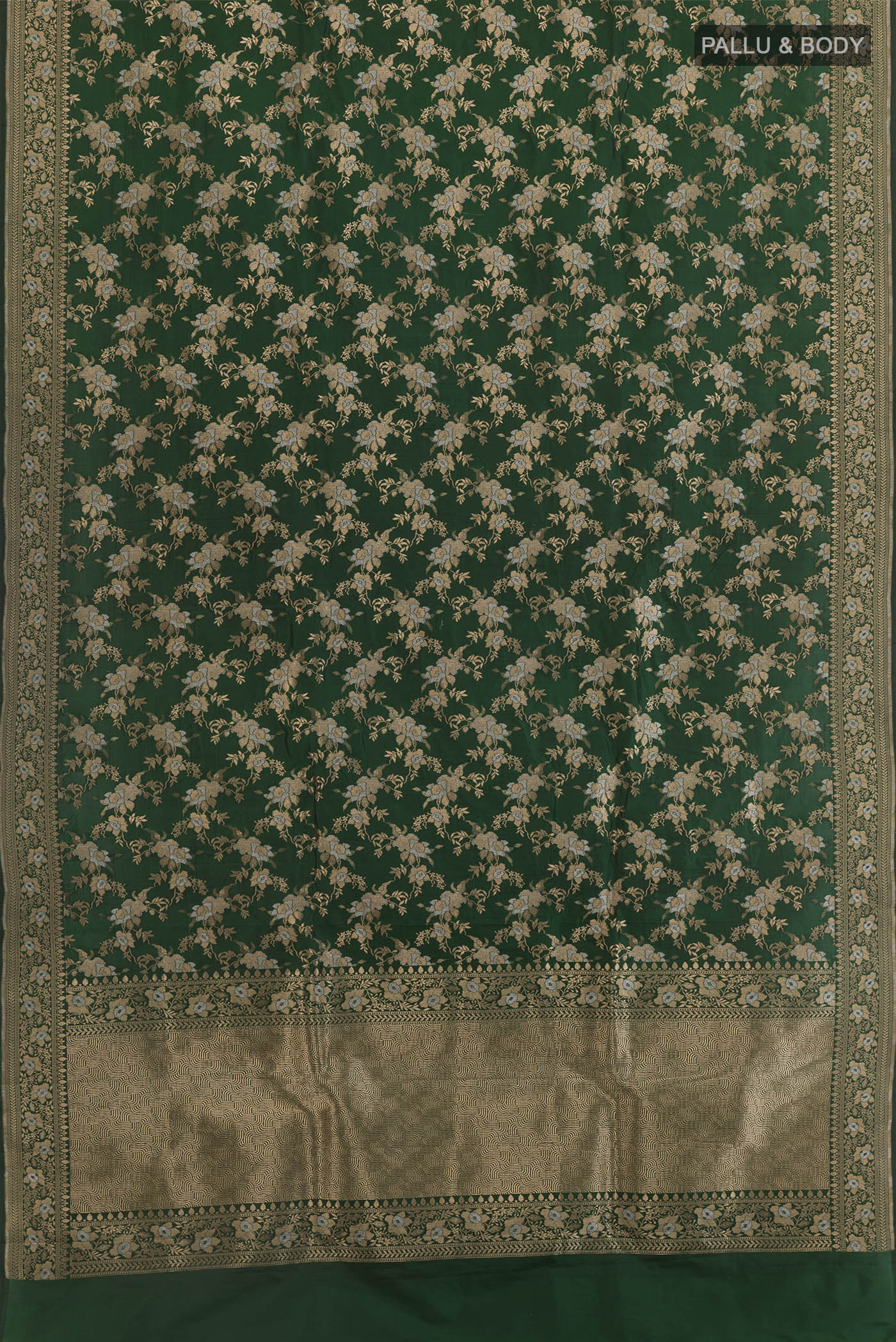 Flat view of Bottle Green Banarasi Silk Saree with Zari Brocade on the body and Zari Border. 
