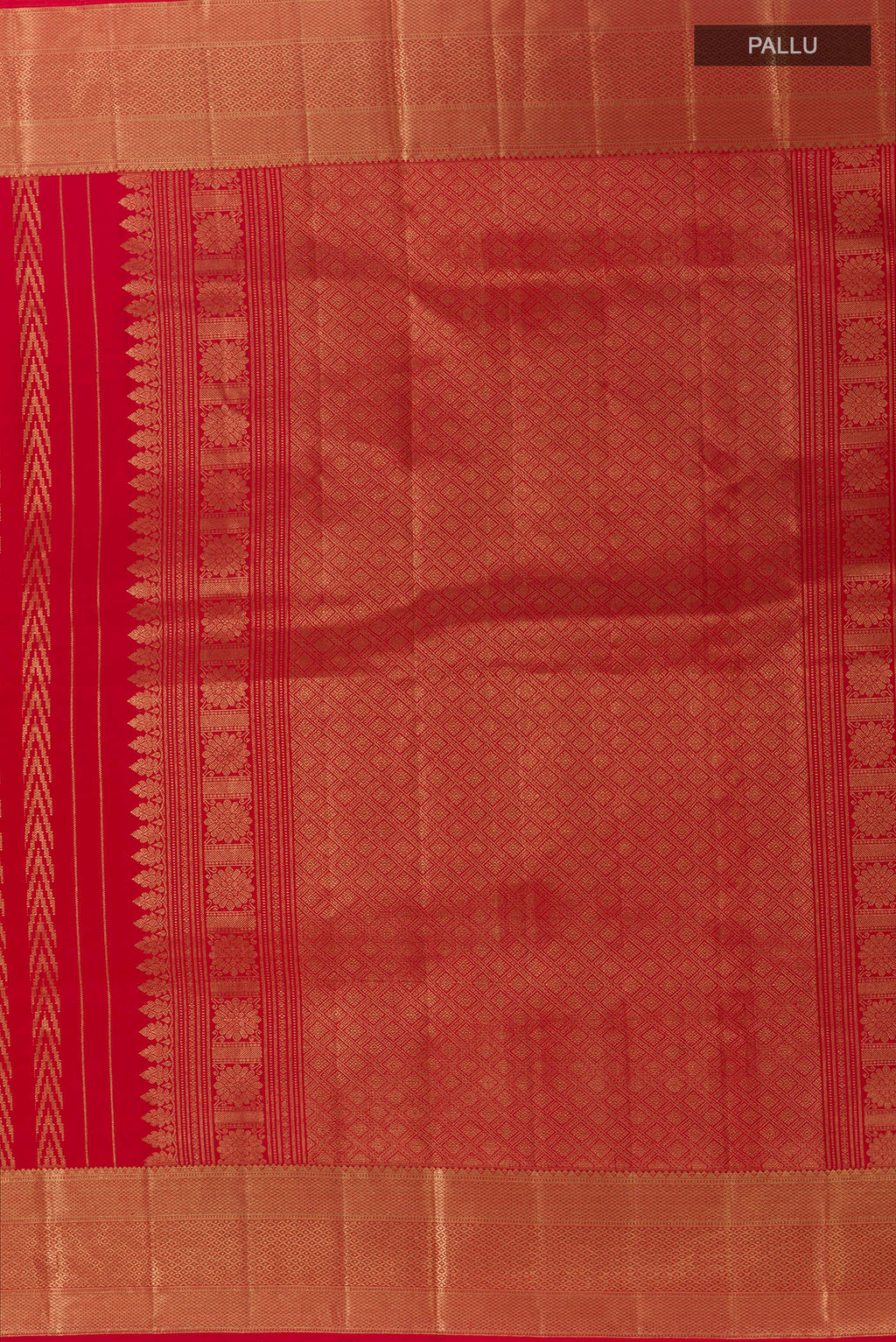 Close up image of the pallu of Red Kanjivaram Silk Saree with Zari Butta on the body and Zari Border. 