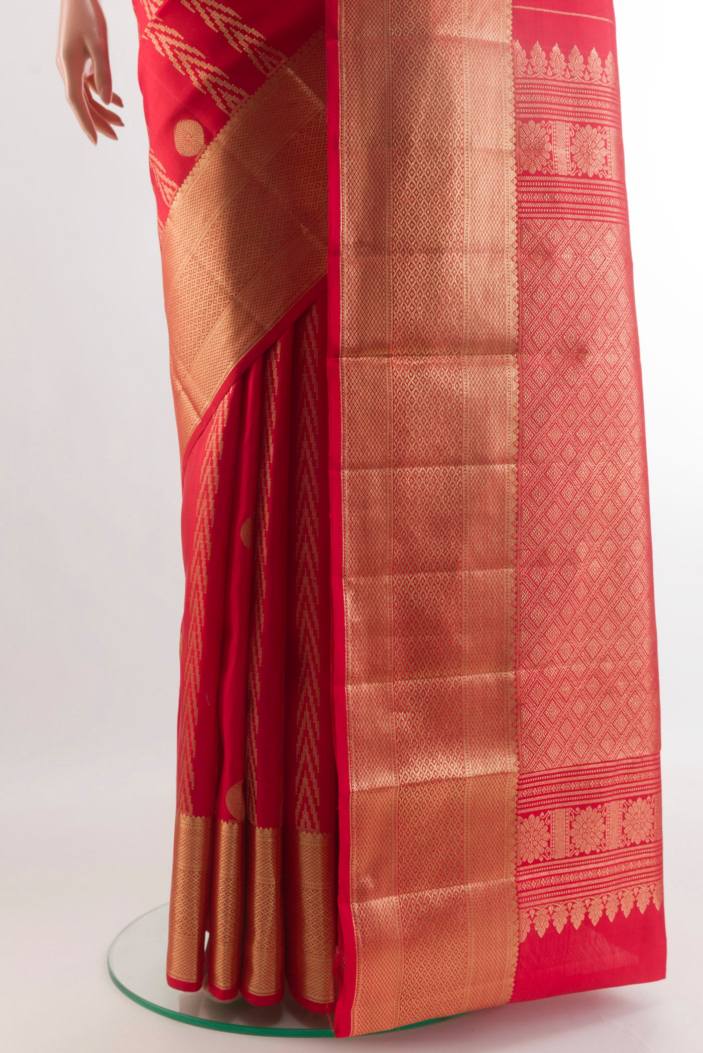 Pleats and pallu of Red Kanjivaram Silk Saree with Zari Butta on the body and Zari Border. 