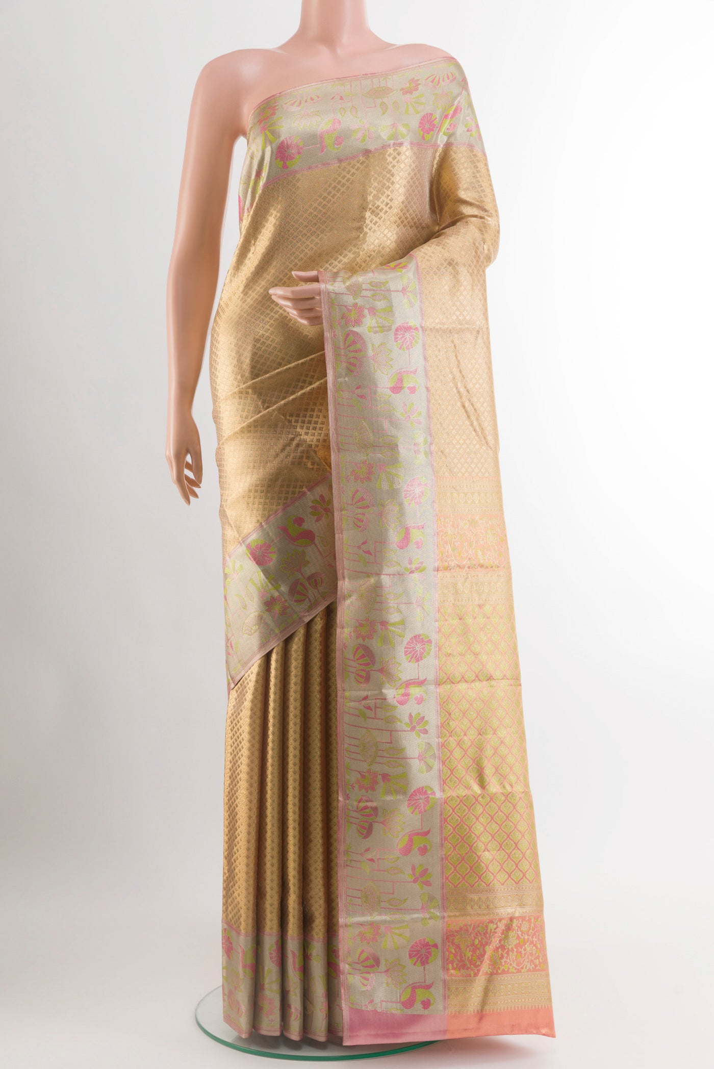 Rose Gold Dual Tone Kanjivaram Tissue Silk Saree with Zari Brocade on the body and Zari Border.  displayed on a mannequin