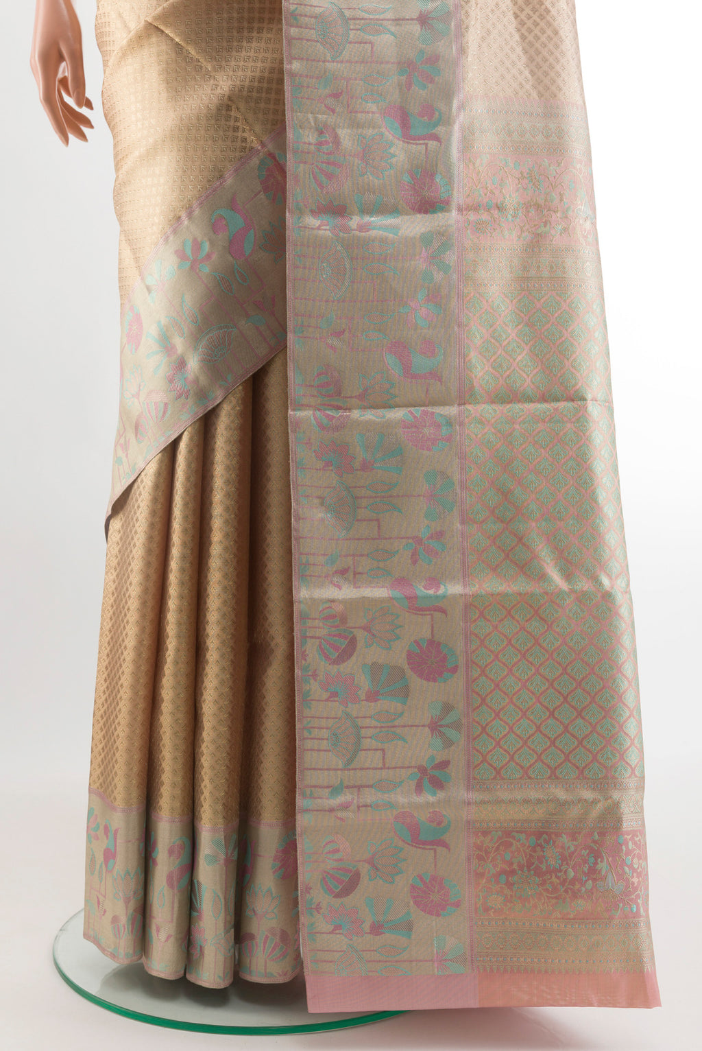 Pleats and pallu of Golden Kanjivaram Tissue Silk Saree with Zari Brocade on the body and Zari Border. 