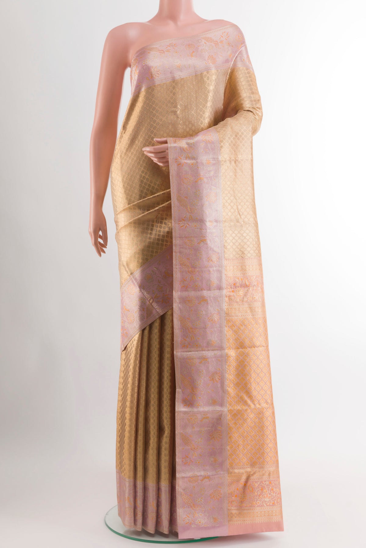 Golden Dual Tone Kanjivaram Tissue Silk Saree with Zari Brocade on the body and Zari Border.  displayed on a mannequin