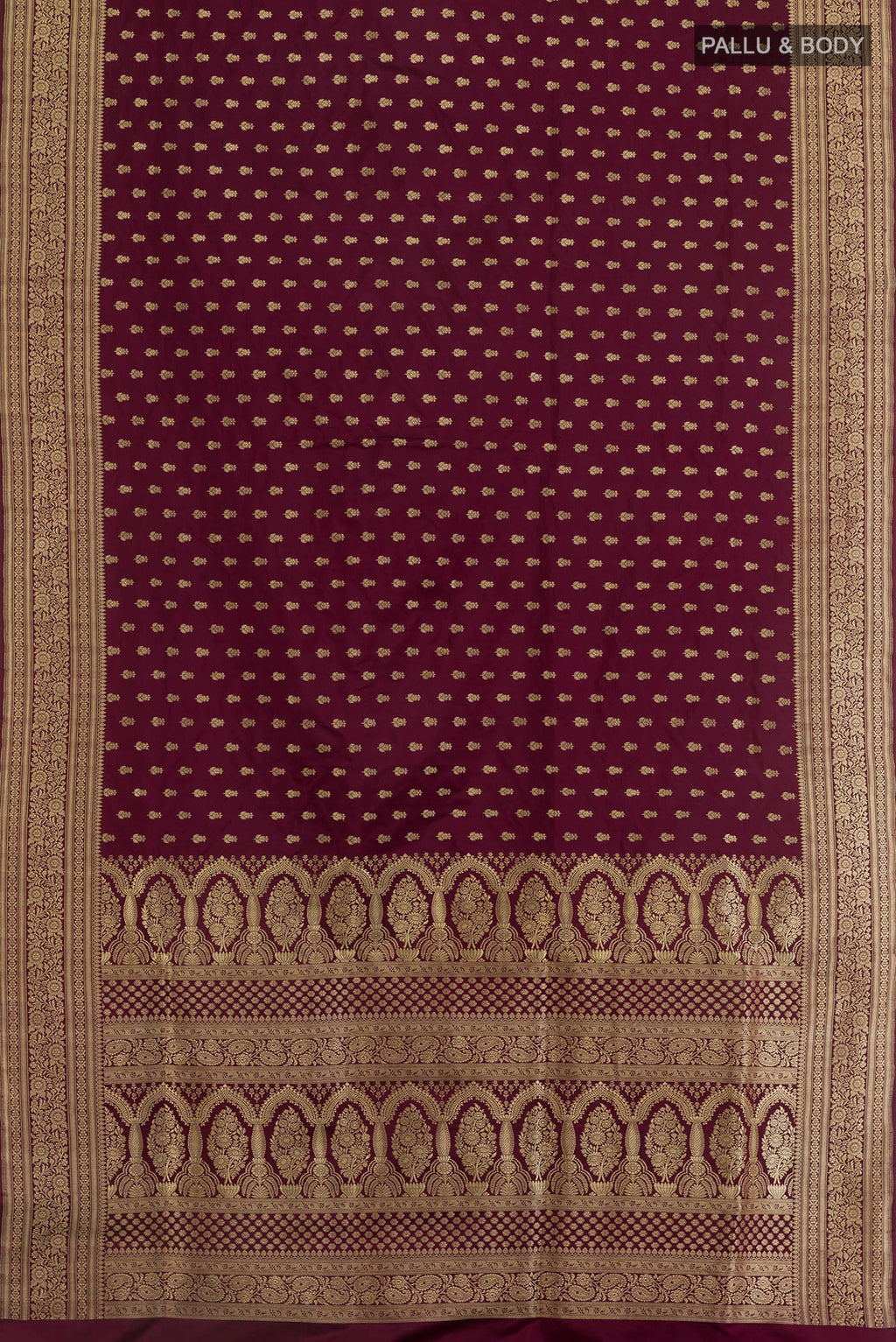 Flat view of Purple Banarasi Silk Saree with Zari Brocade on the body and Zari Border. 