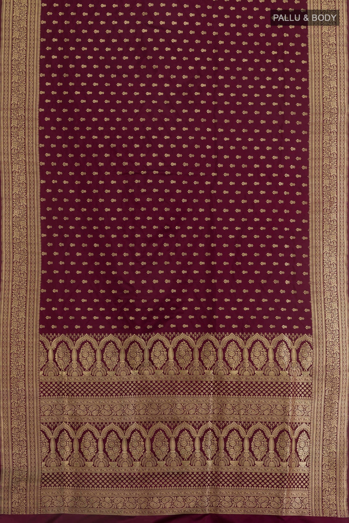 Flat view of Purple Banarasi Silk Saree with Zari Brocade on the body and Zari Border. 
