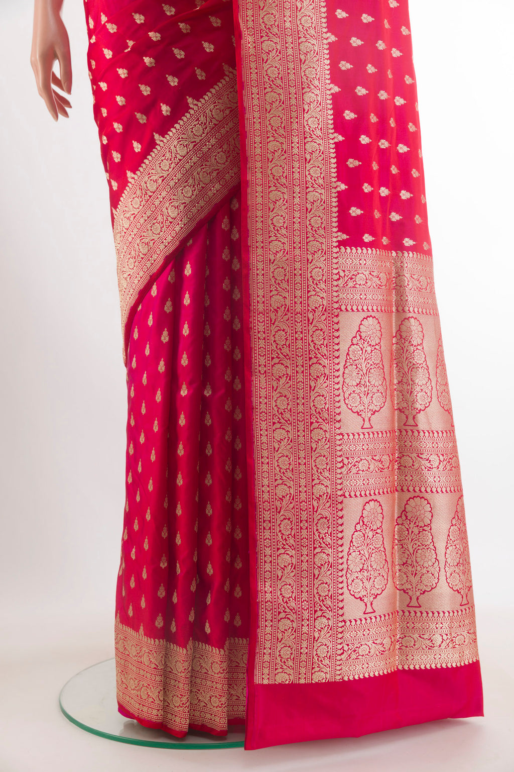 Pleats and pallu of Red Banarasi Saree with Zari Butta on the body and Zari Border. 