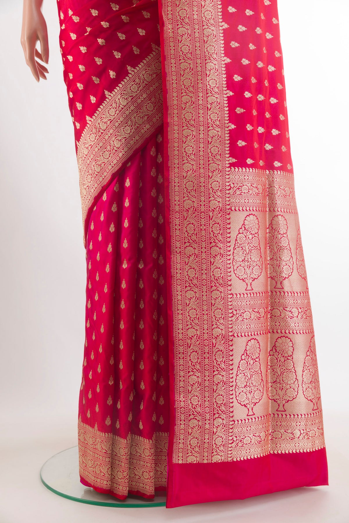 Pleats and pallu of Red Banarasi Saree with Zari Butta on the body and Zari Border. 