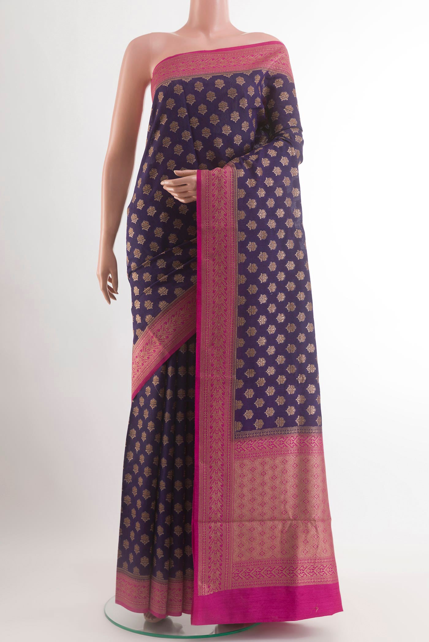 Blue Tussar Silk Saree with Zari Butta on the body and Zari Border.  displayed on a mannequin