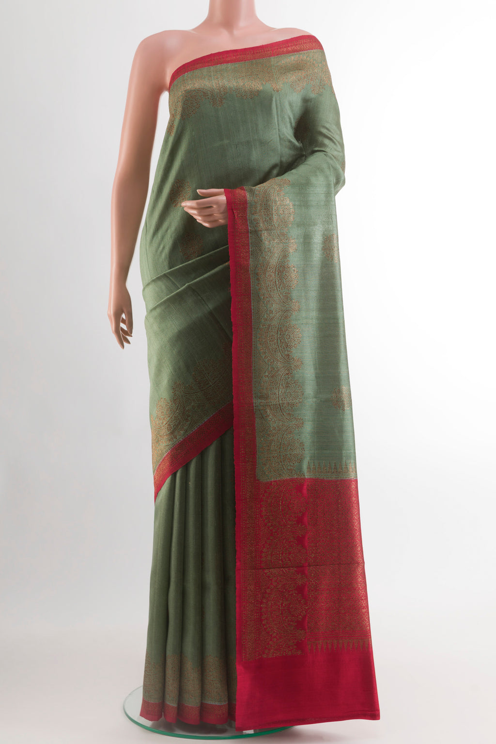 Grey Banarasi Tussar Silk Saree with Zari Butta on the body and Zari Border.  displayed on a mannequin