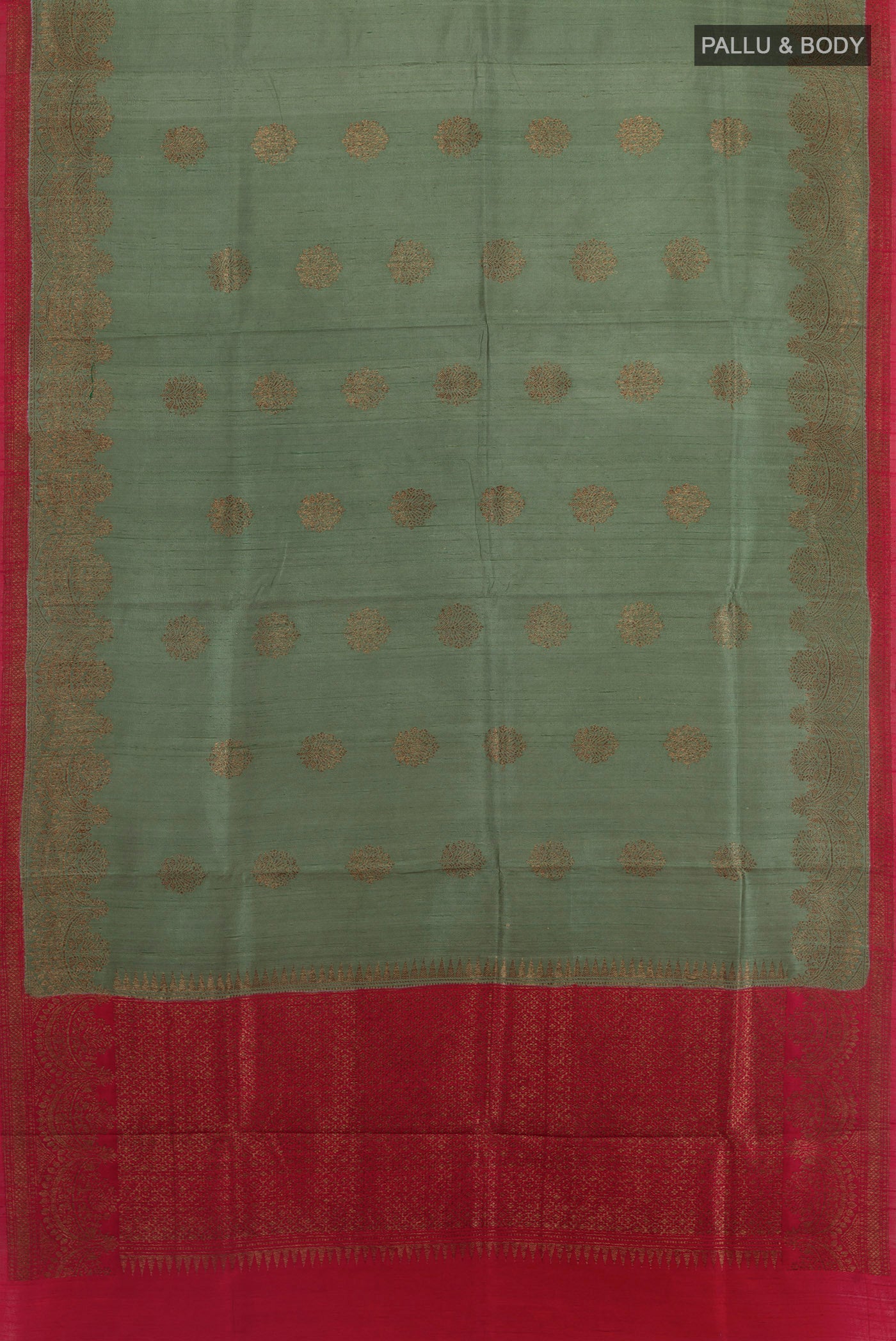 Flat view of Grey Banarasi Tussar Silk Saree with Zari Butta on the body and Zari Border. 