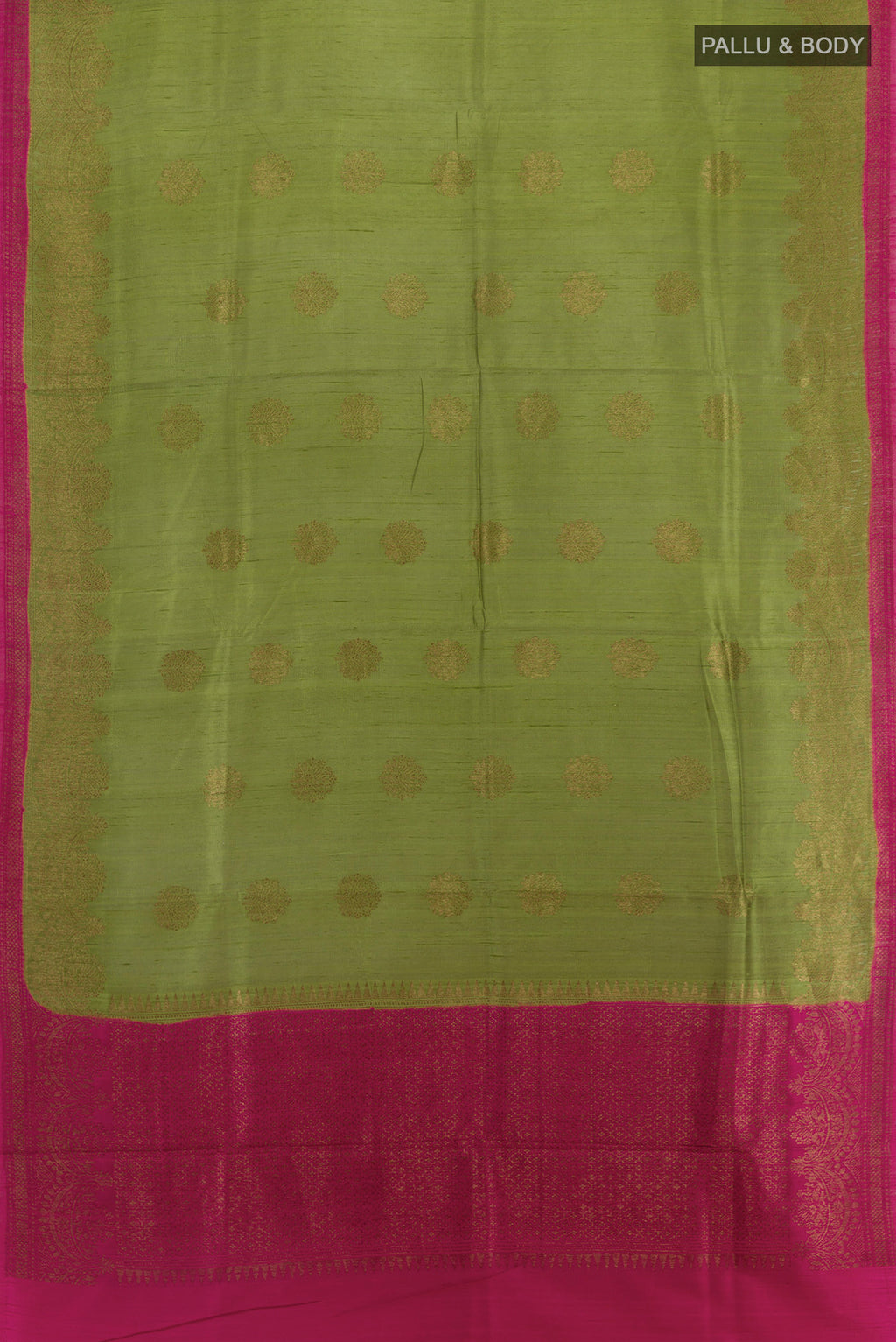 Flat view of Green Banarasi Tussar Silk Saree with Zari Butta on the body and Zari Border. 