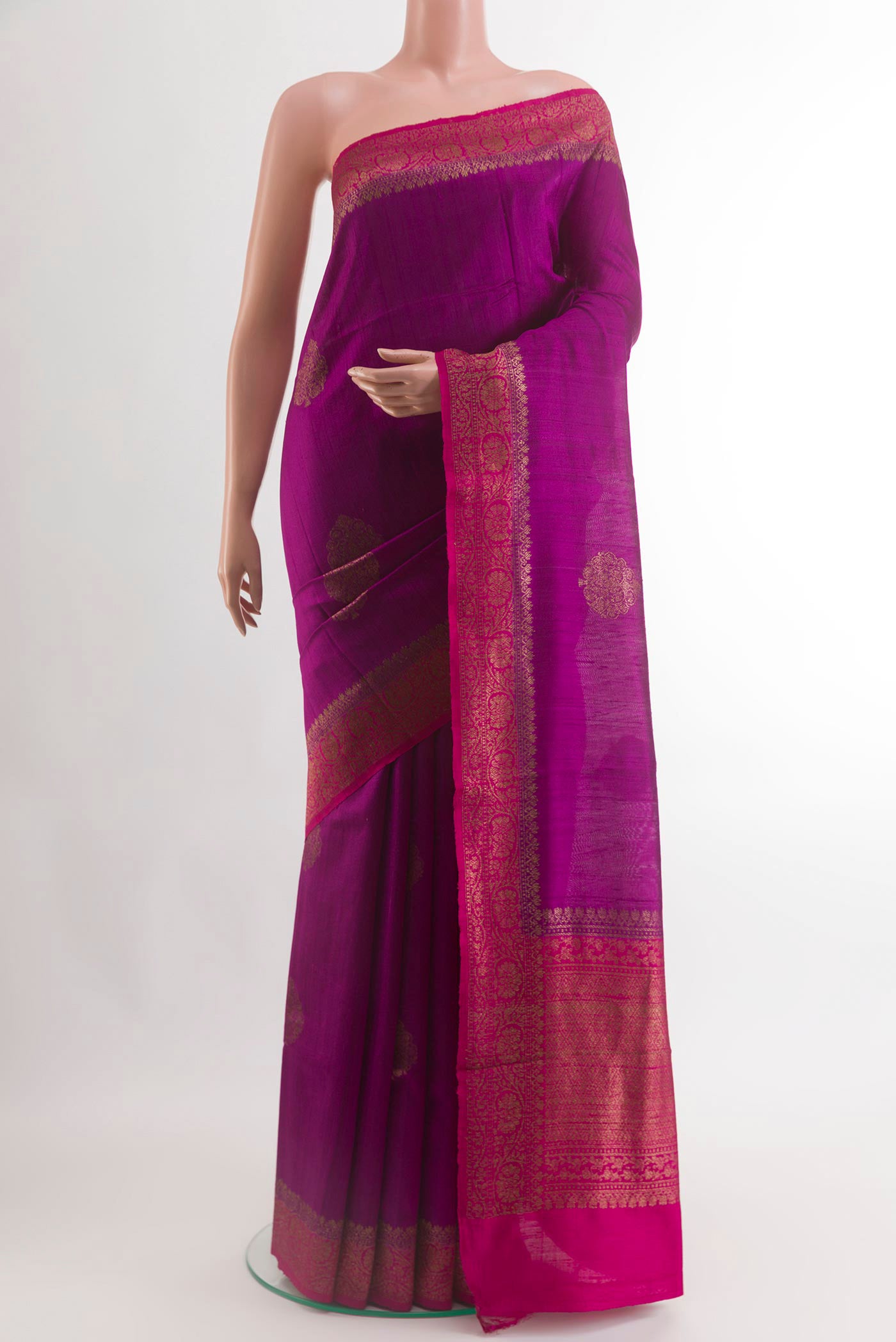 Purple Banarasi Tussar Silk Saree with Zari Butta on the body and Zari Border.  displayed on a mannequin