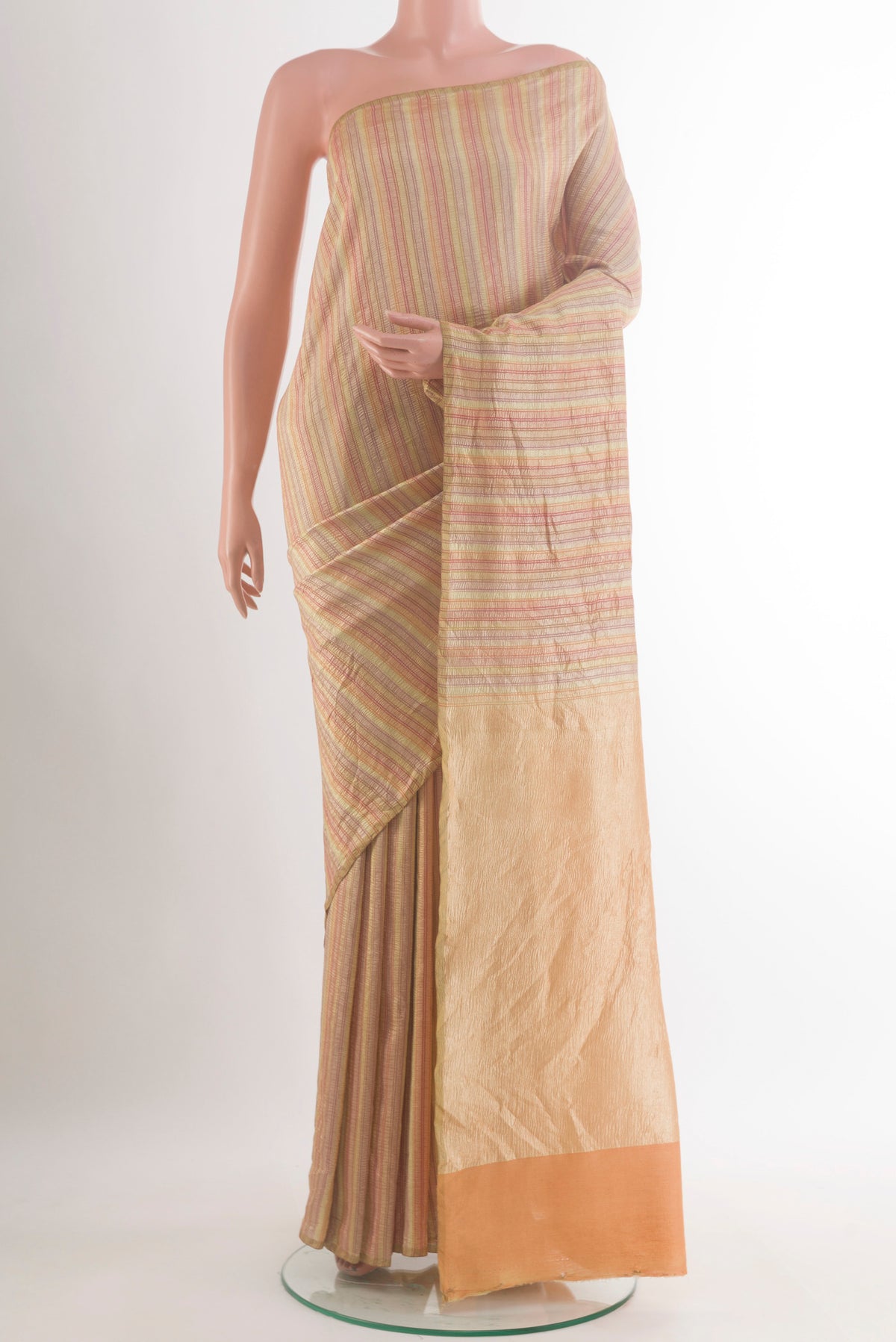 Multi Color Tussar Saree with Stripes on the body and Zari Border.  displayed on a mannequin