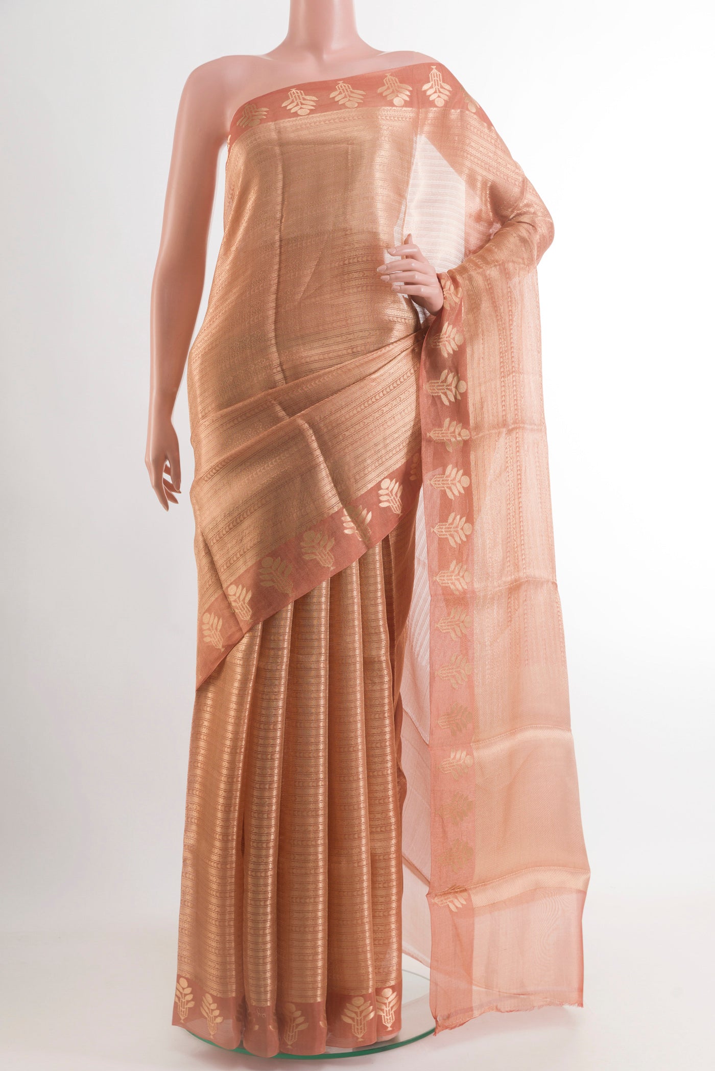 Peach Banarasi Kora Silk Saree with Zari Brocade on the body and Zari Border.  displayed on a mannequin
