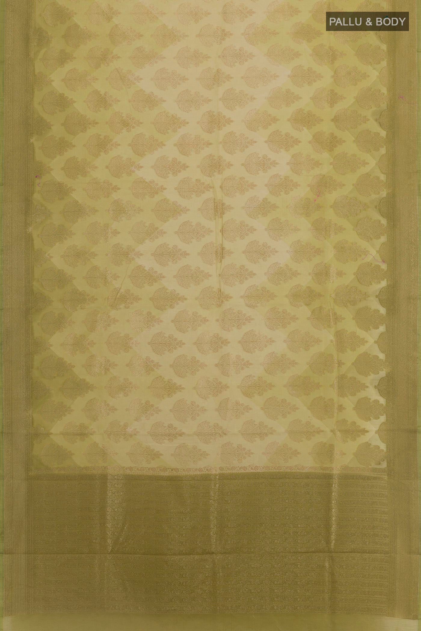 Flat view of Green Blended Kora Cotton Saree with Zari Butta on the body and Zari Border. 