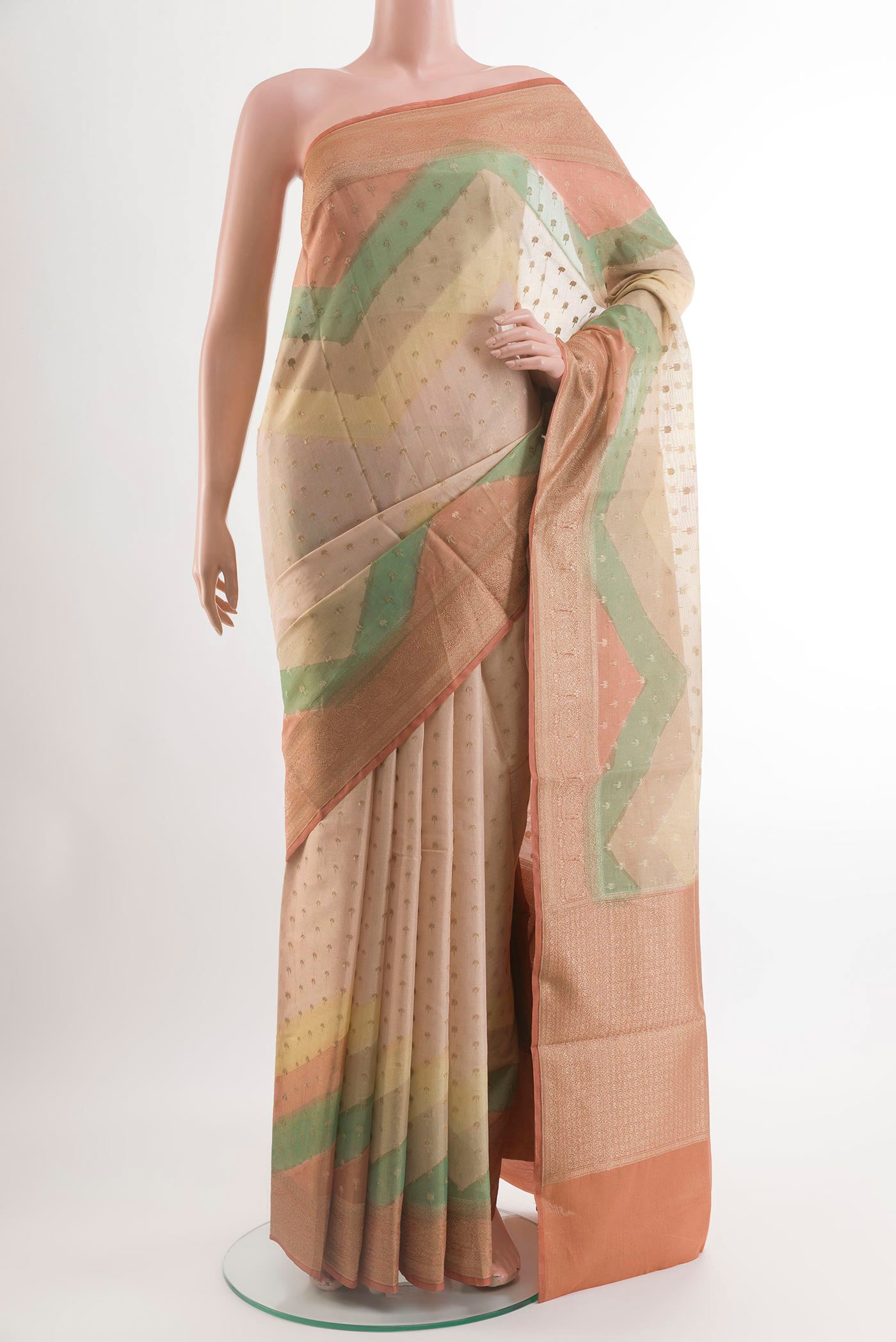 Cream Blended Kora Cotton Saree with Zari Butta on the body and Zari Border.  displayed on a mannequin
