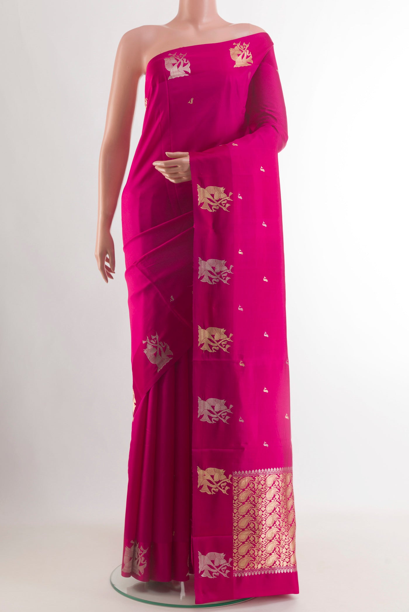 Pink Banarasi Katan Silk Saree with Zari Butta on the body and Zari Border.  displayed on a mannequin