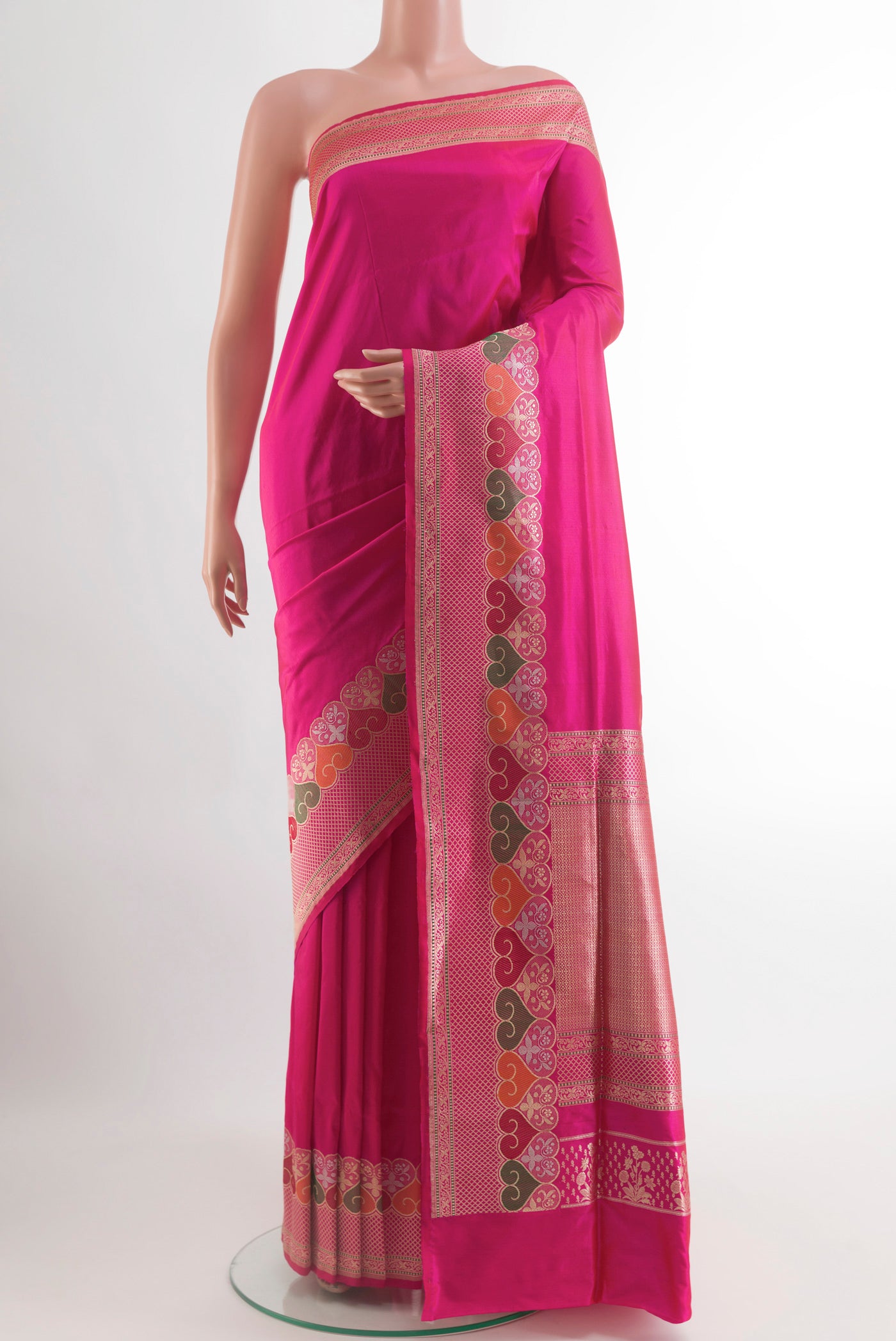 Pink Banarasi Silk Saree with Plain Body and Zari Border.  displayed on a mannequin