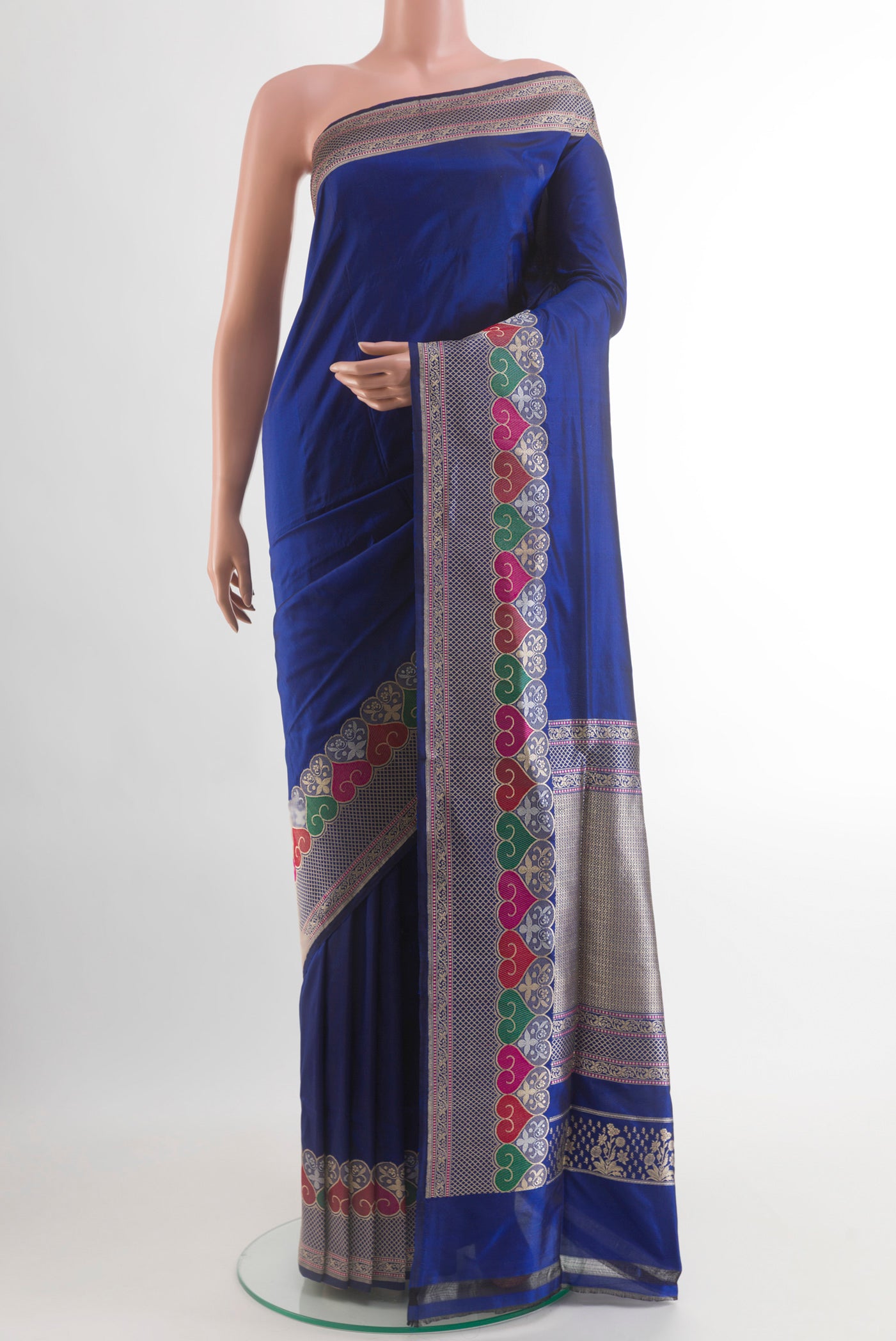 Blue Banarasi Silk Saree with Plain Body and Zari Border.  displayed on a mannequin