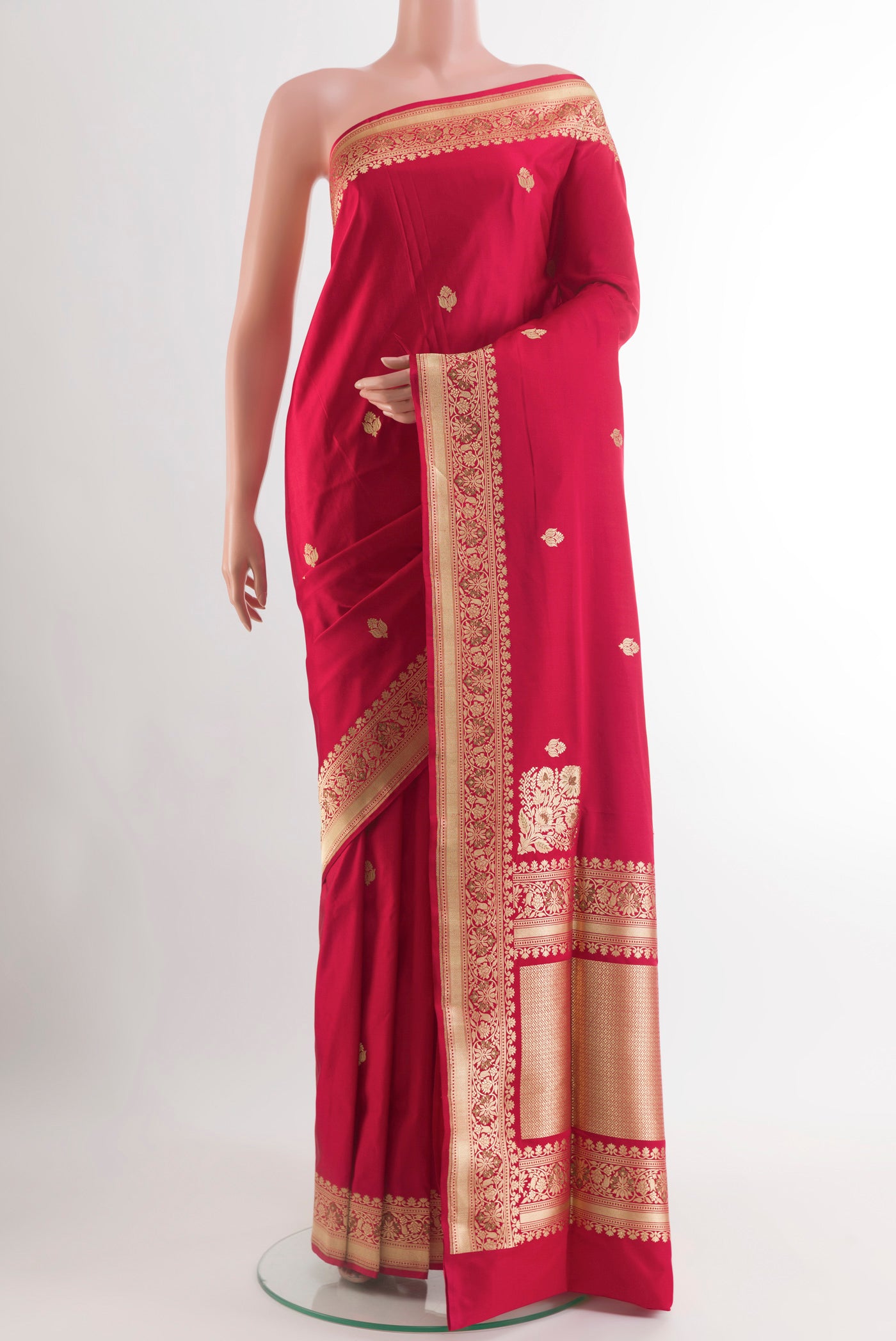 Red Banarasi Silk Saree with Zari Butta on the body and Zari Border.  displayed on a mannequin