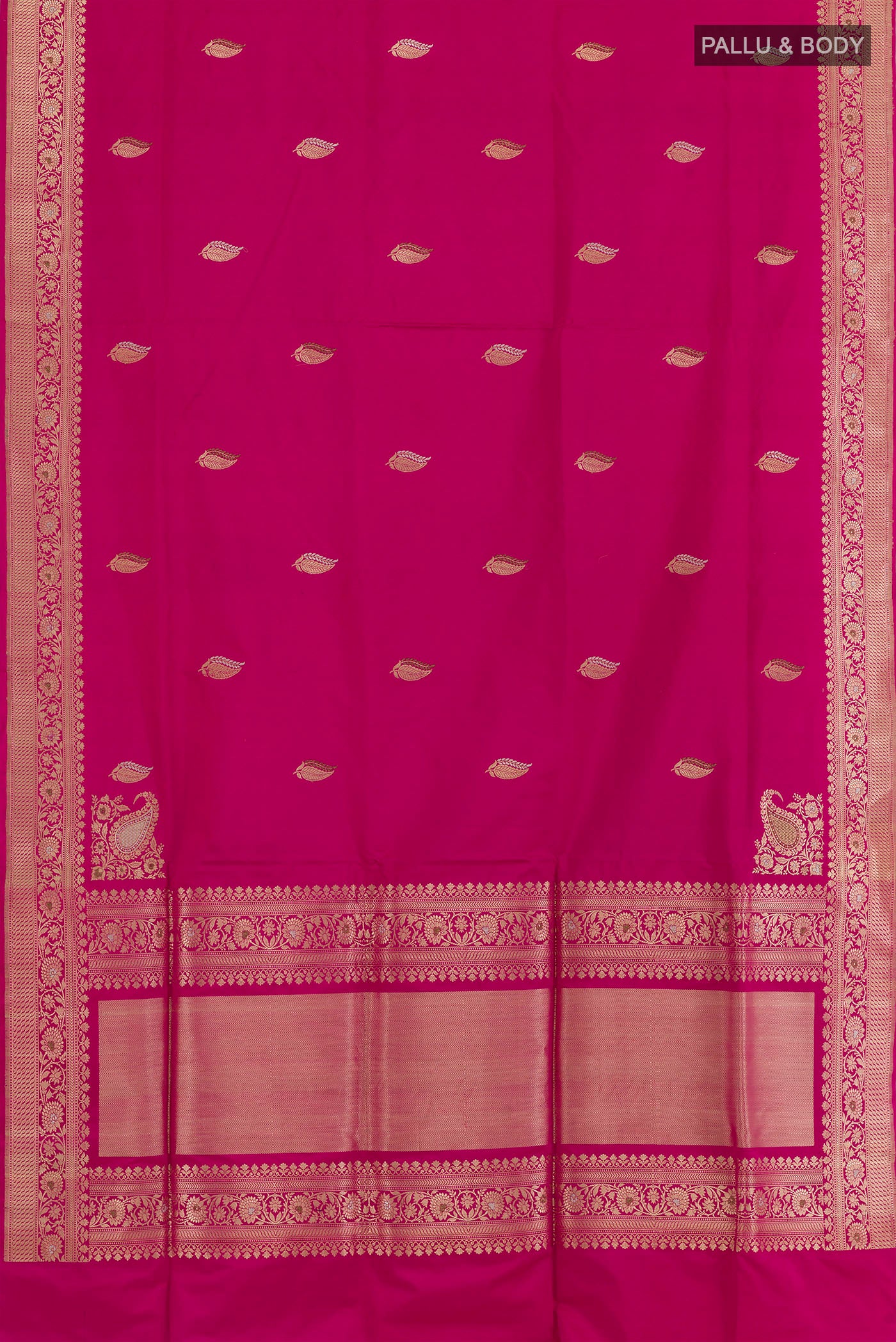 Flat view of Rani Pink Banarasi Silk Saree with Zari Butta on the body and Zari Border. 