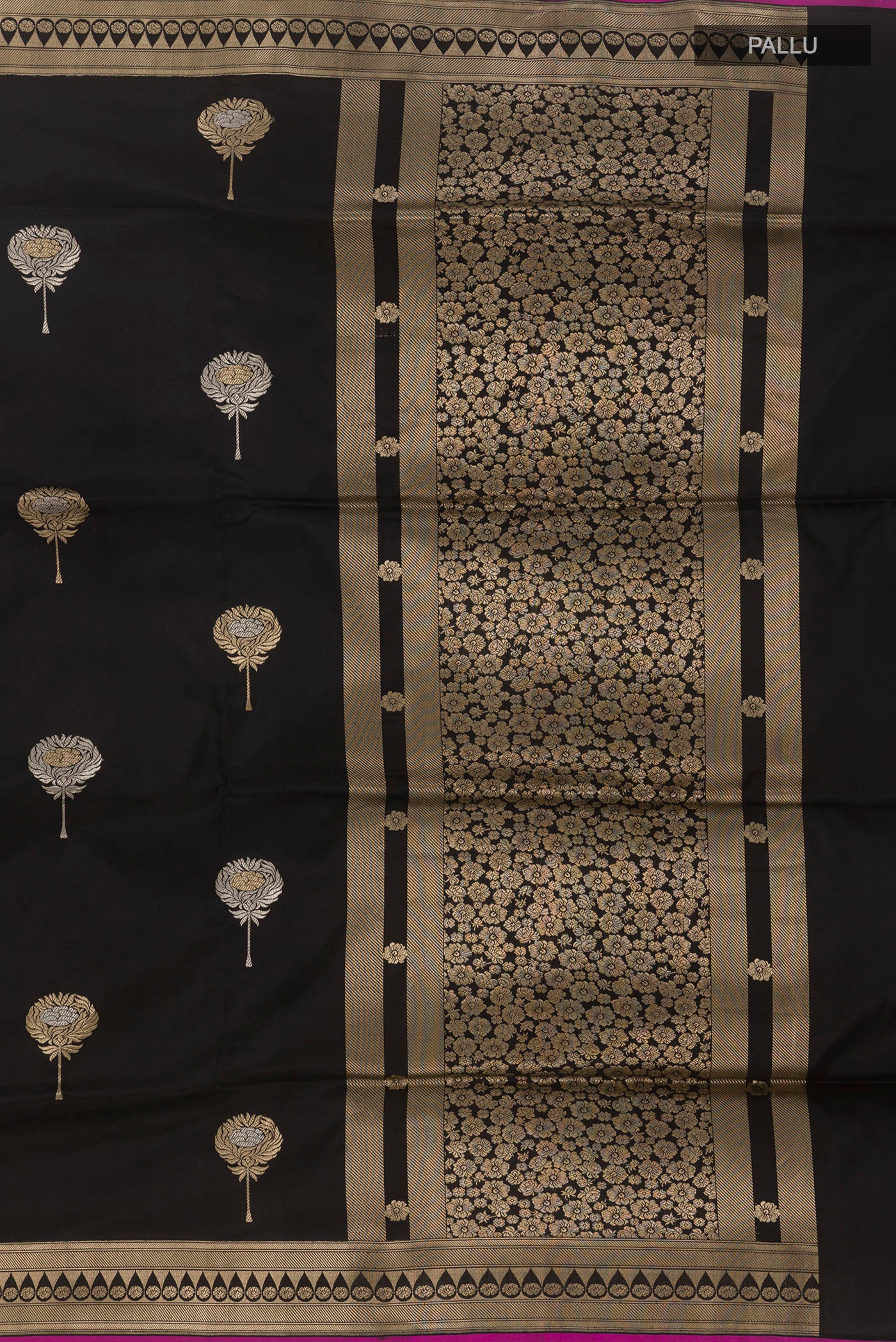 Close up image of the pallu of Black Banarasi Silk Saree with Zari Butta on the body and Zari Border. 