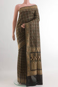 Black Banarasi Jamavar Saree with Jamdani on the body and Thread Border.  displayed on a mannequin